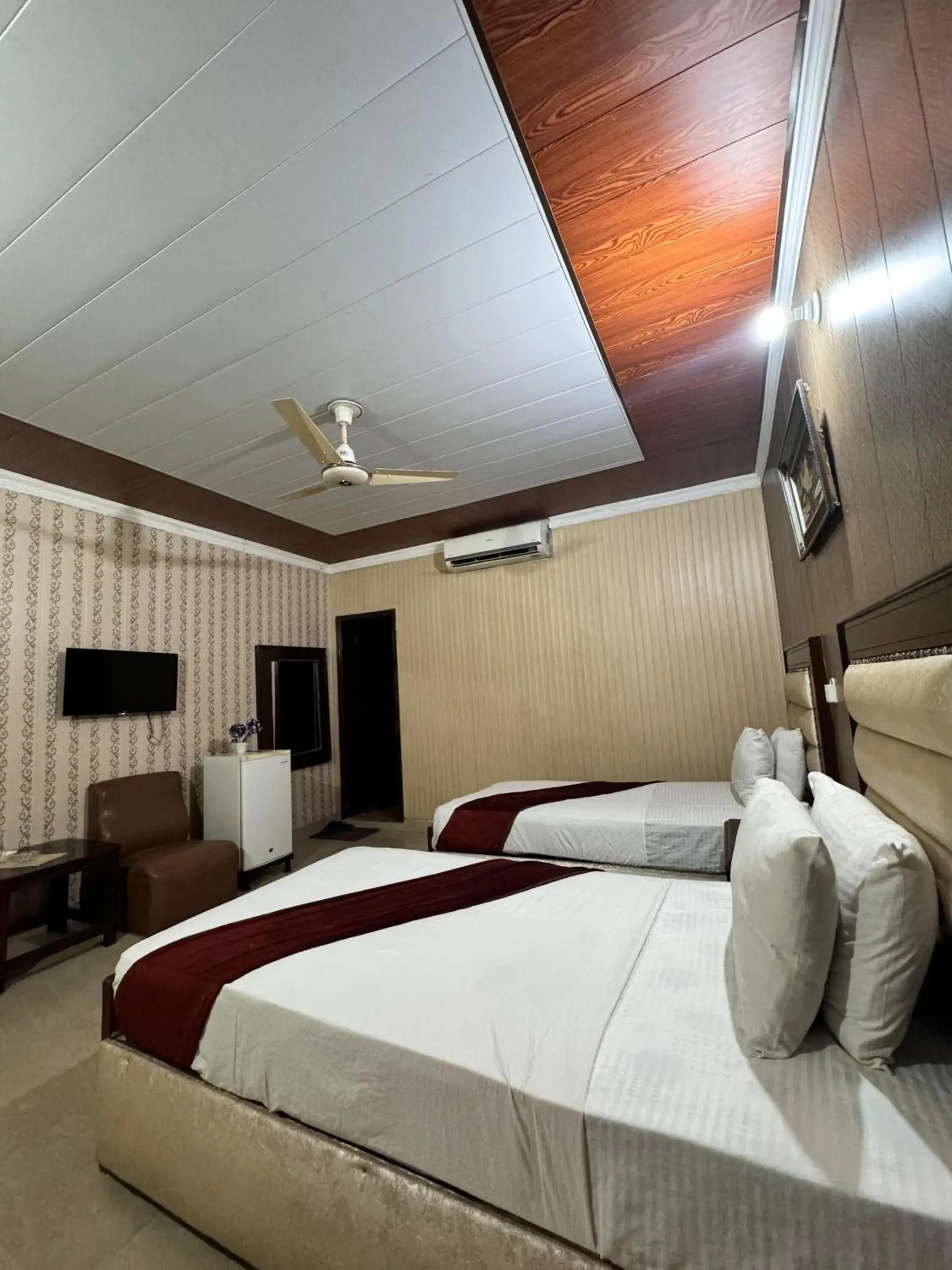 Standard Double Room with Fan in Hotel Tulip INN Faisal Town Standard Double Room with Fan in Hotel Tulip INN Faisal Town