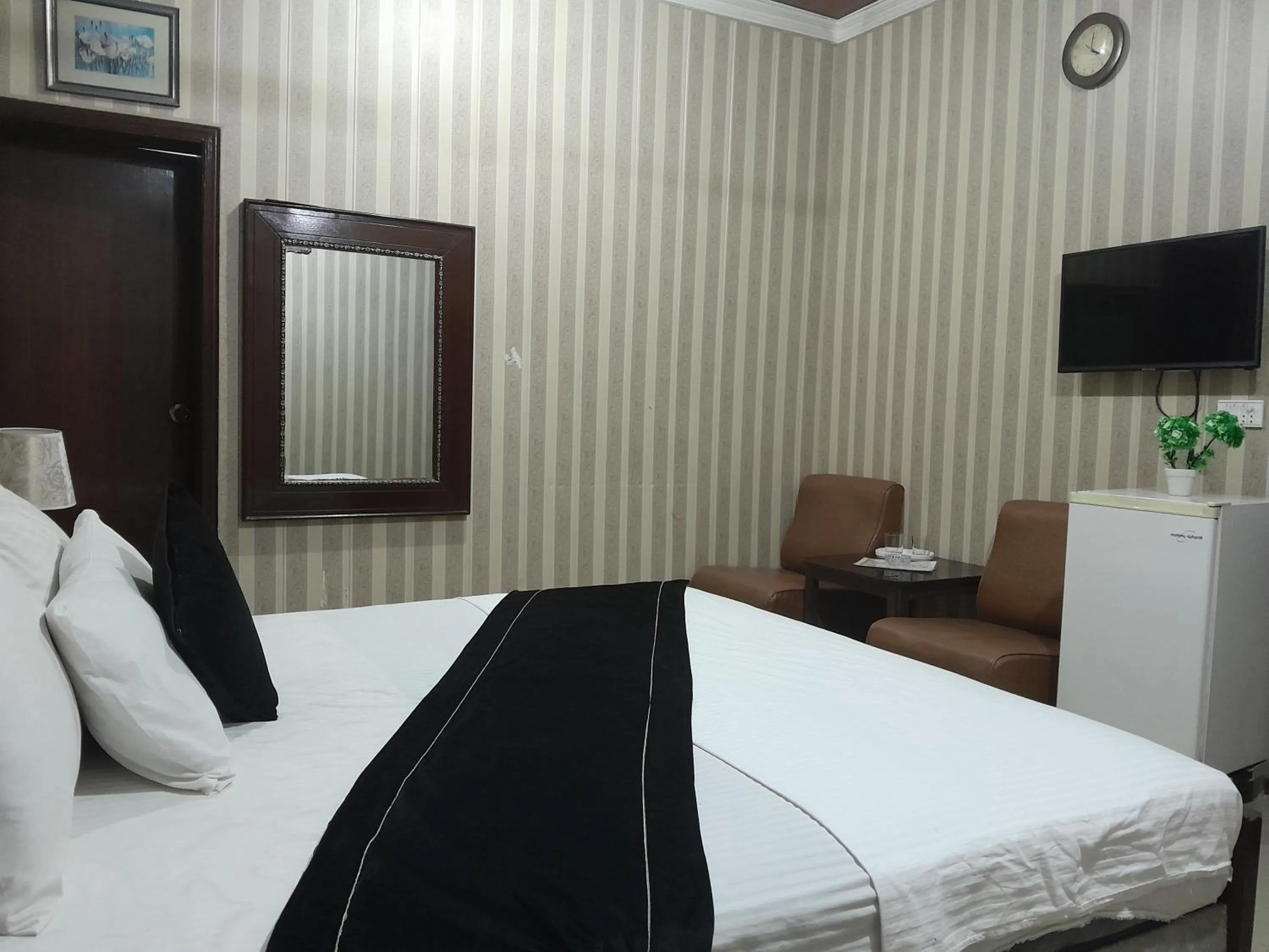 Bed in Hotel Tulip INN Faisal Town
