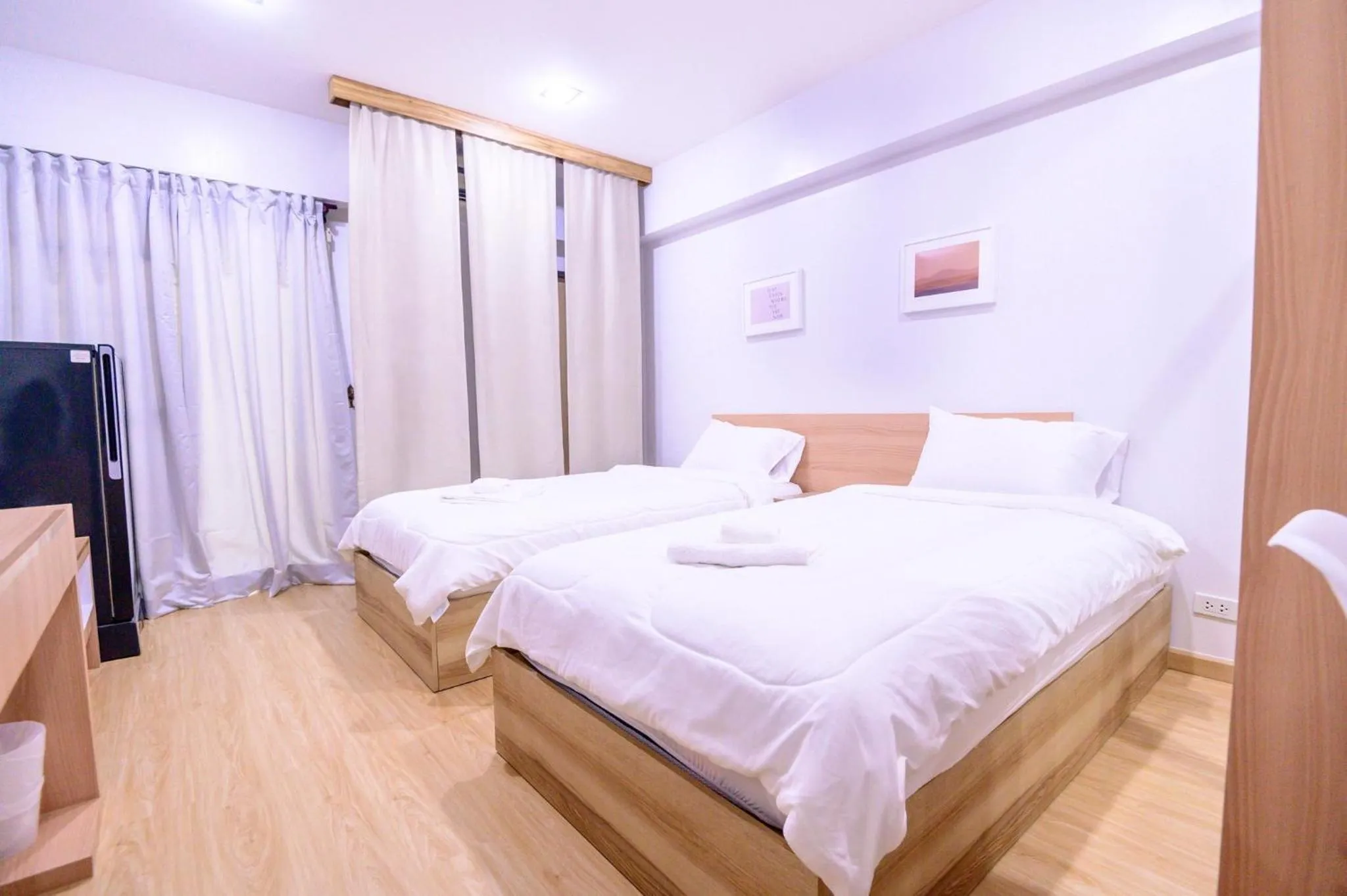 Bed in Creston Grand Hotel Suphan Buri