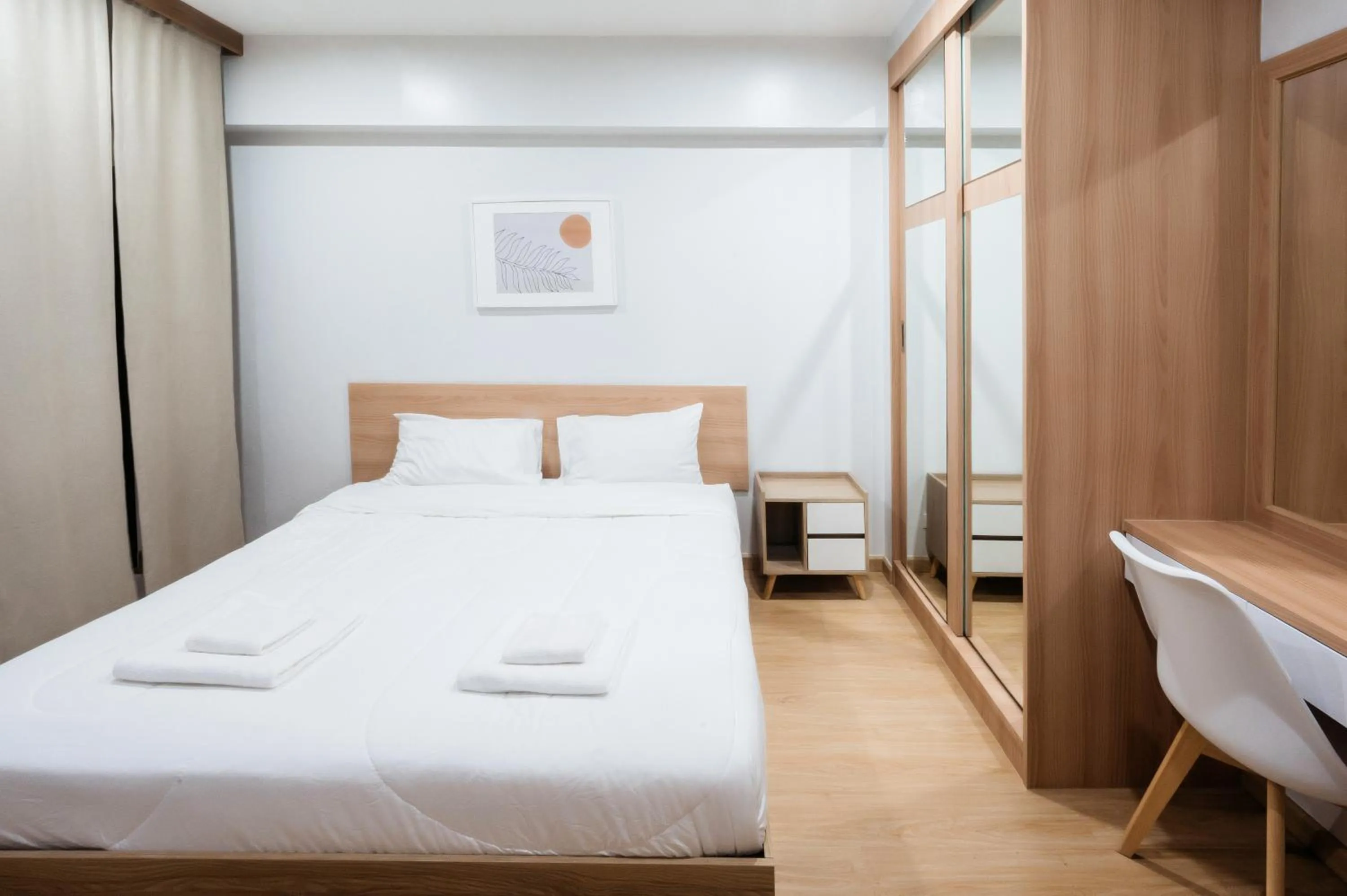 Bed in Creston Grand Hotel Suphan Buri