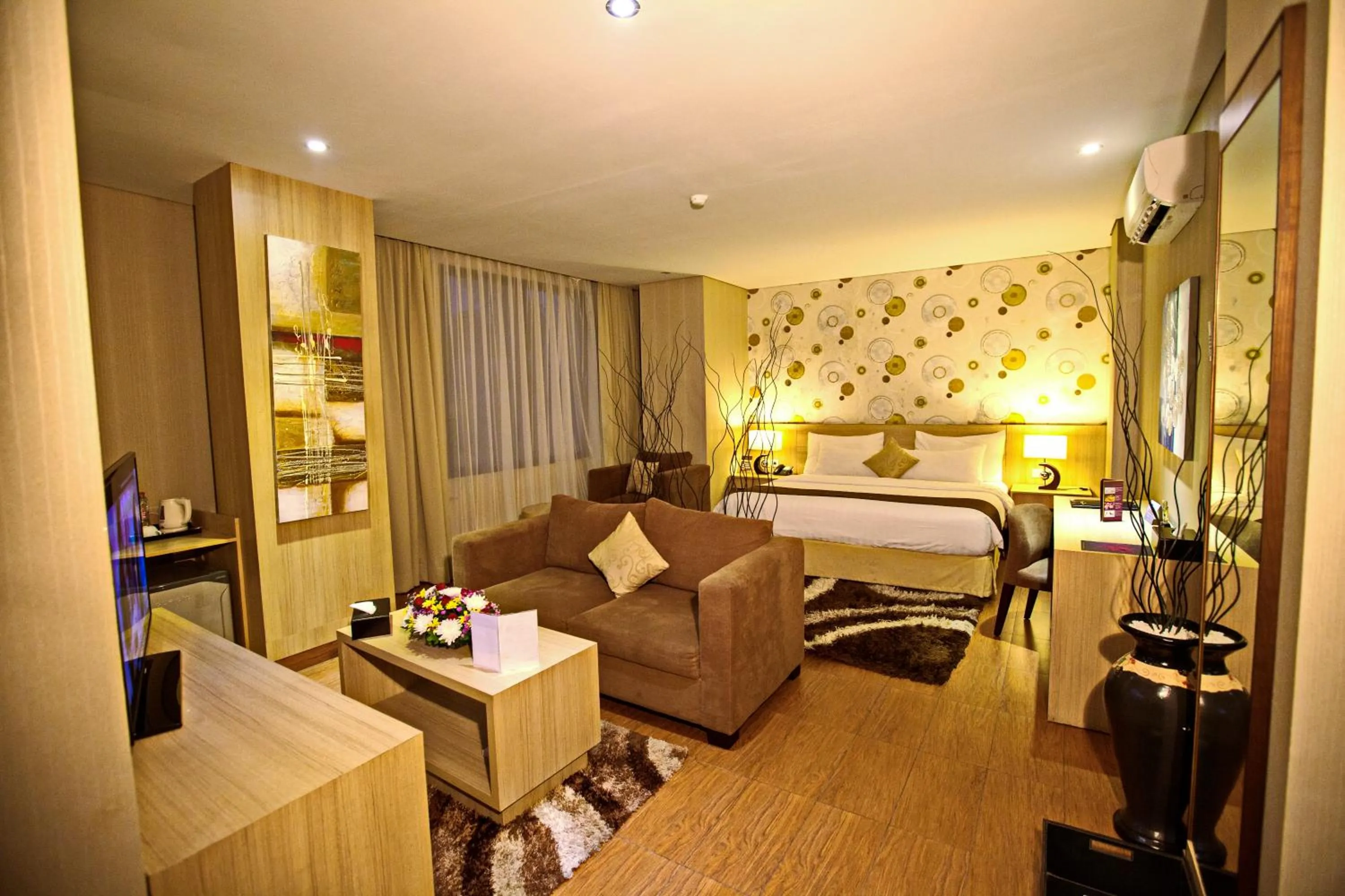 Bed in Padjadjaran Suites Resort and Convention Hotel