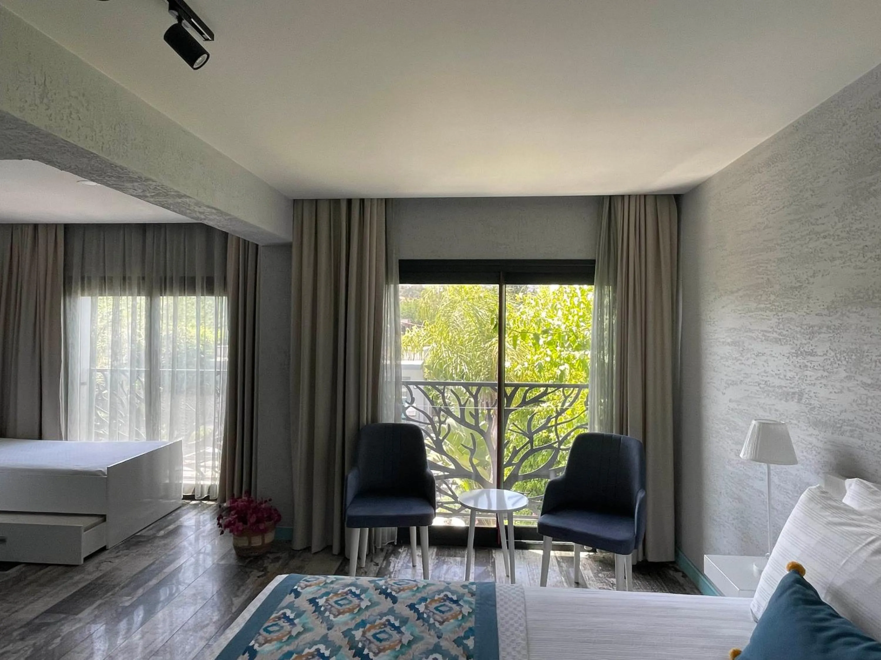 Seating area, Bed in Villa Oliva Butik Hotel