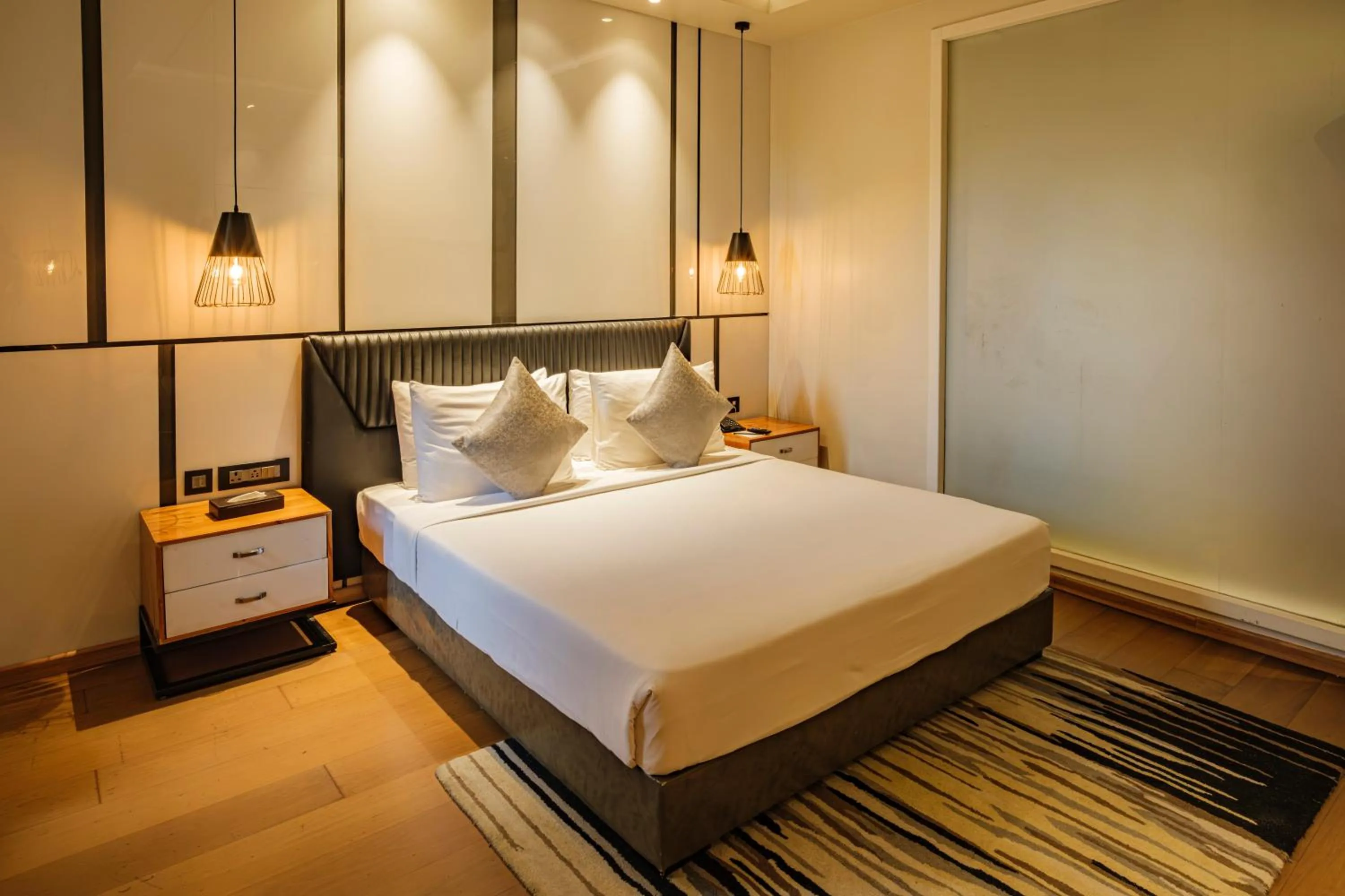 Bed in Udman Hotel Greater Noida