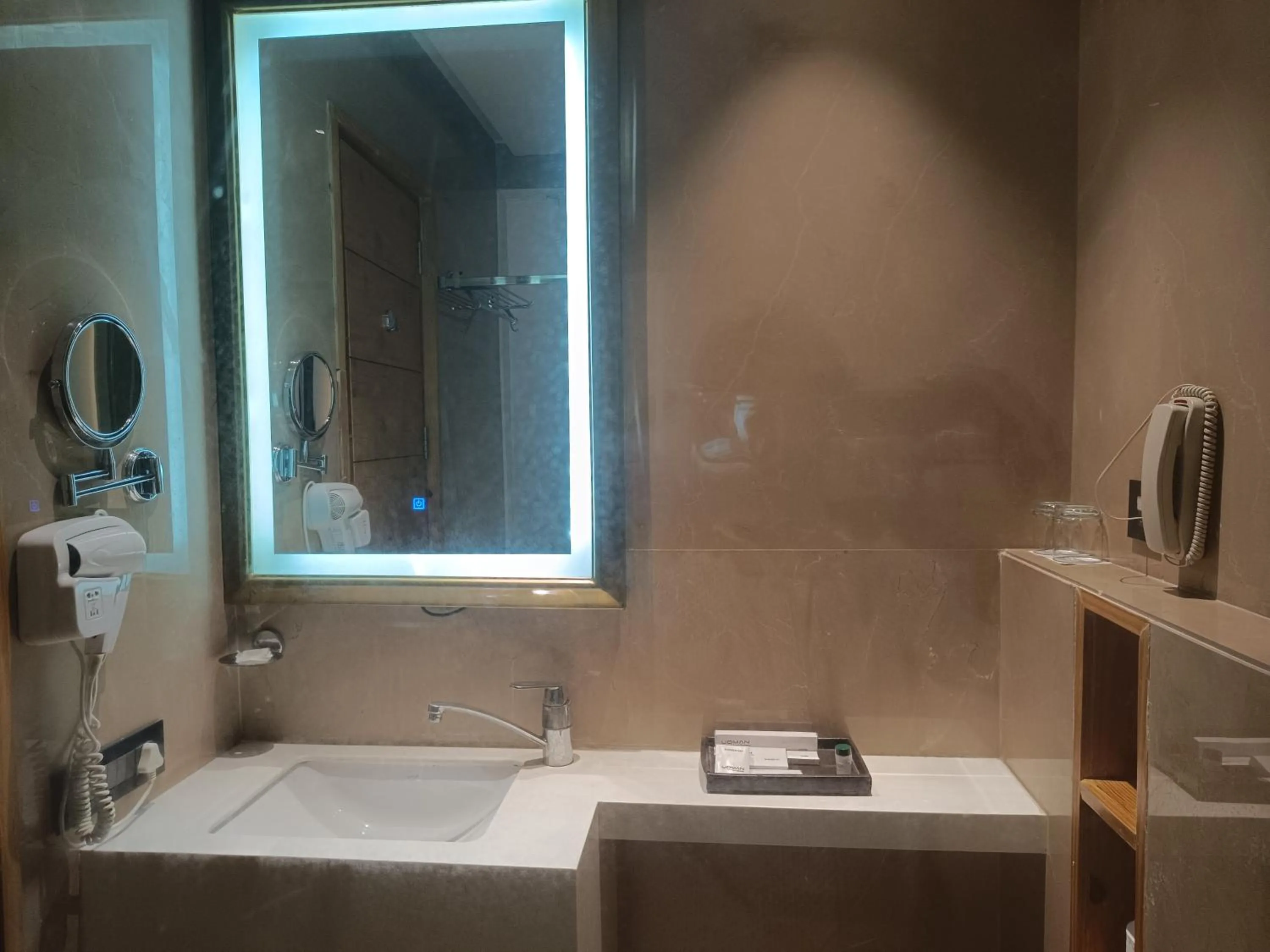 Bathroom in Udman Hotel Greater Noida