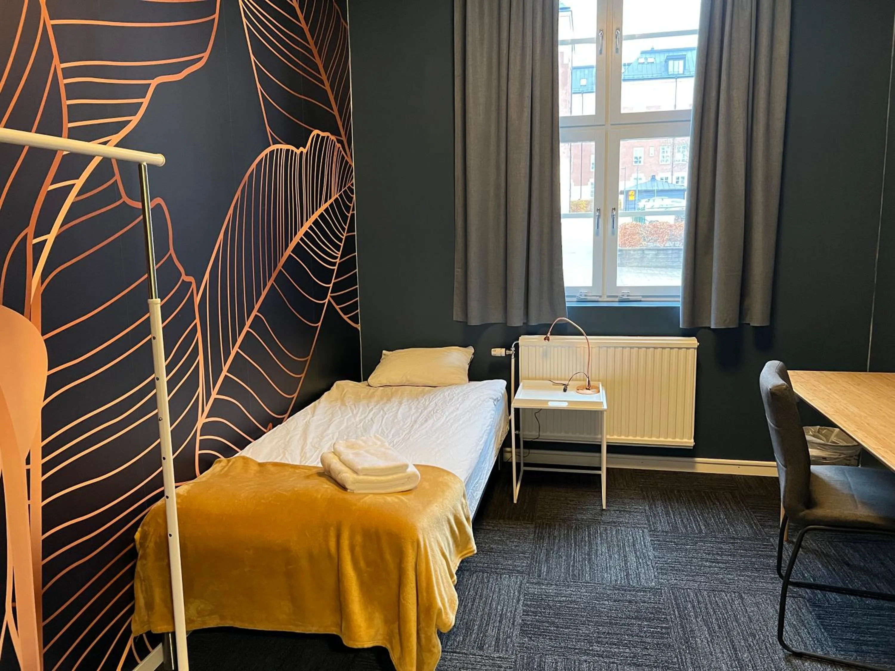 Photo of the whole room, Bed in Mini-Hotel Borås Regementet