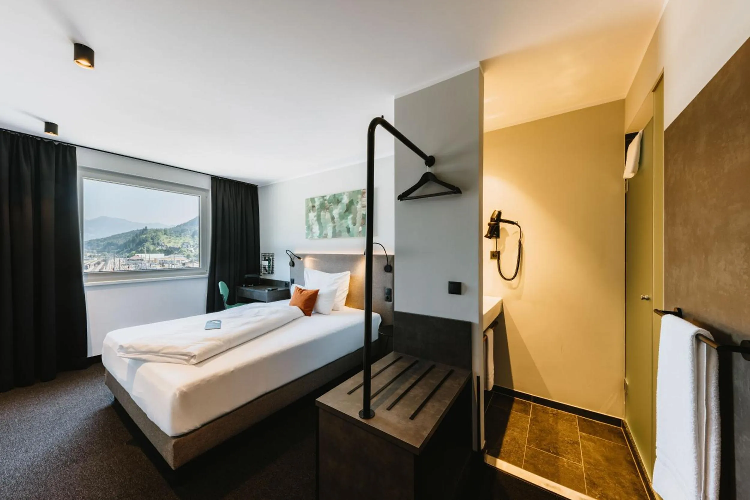 Photo of the whole room, Bed in NIGHT INN Hotel Bahnhofcity Feldkirch