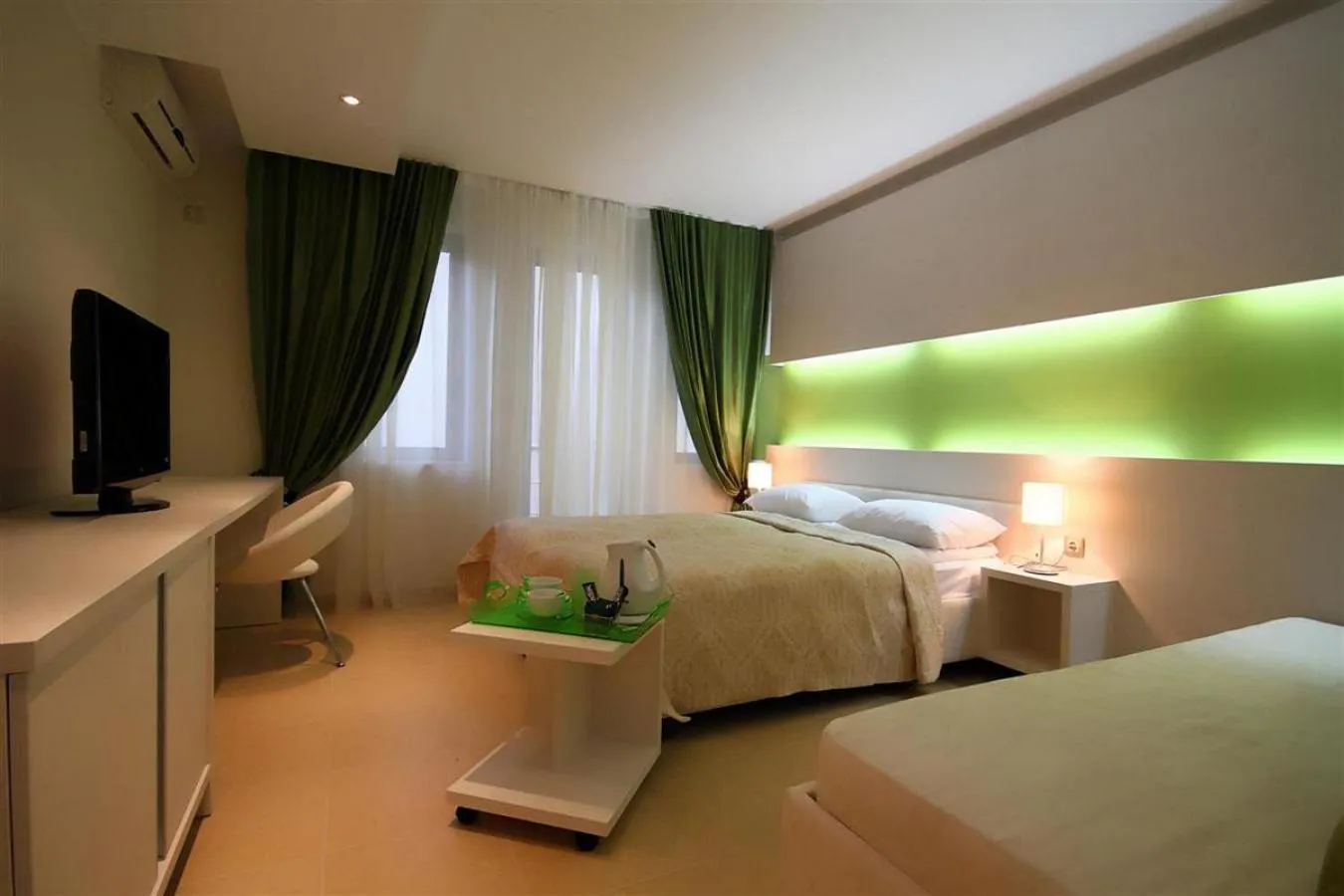 Bed in Domador Rooms & Apartments