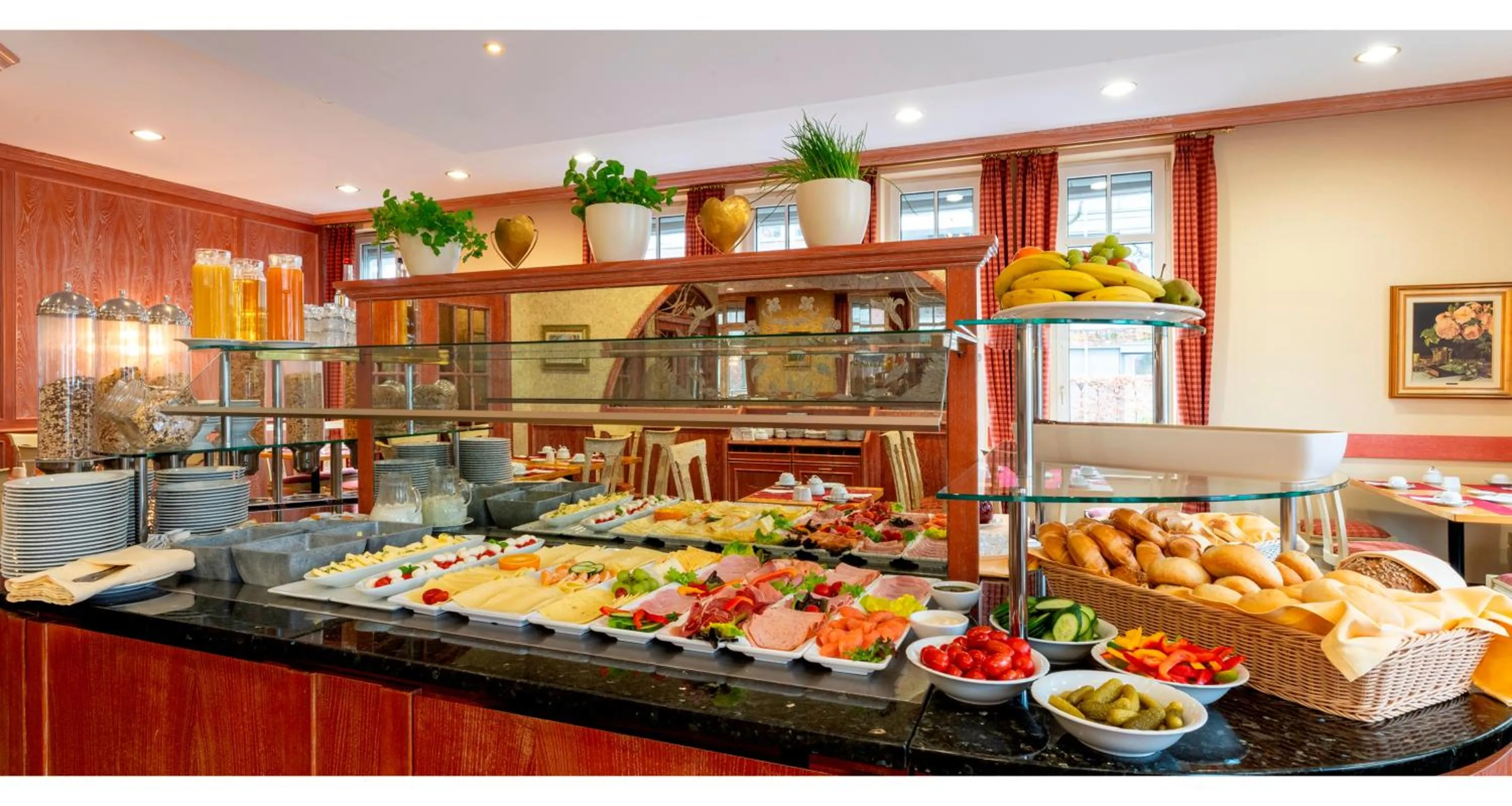 Buffet breakfast in PLAZA Premium Parkhotel Norderstedt