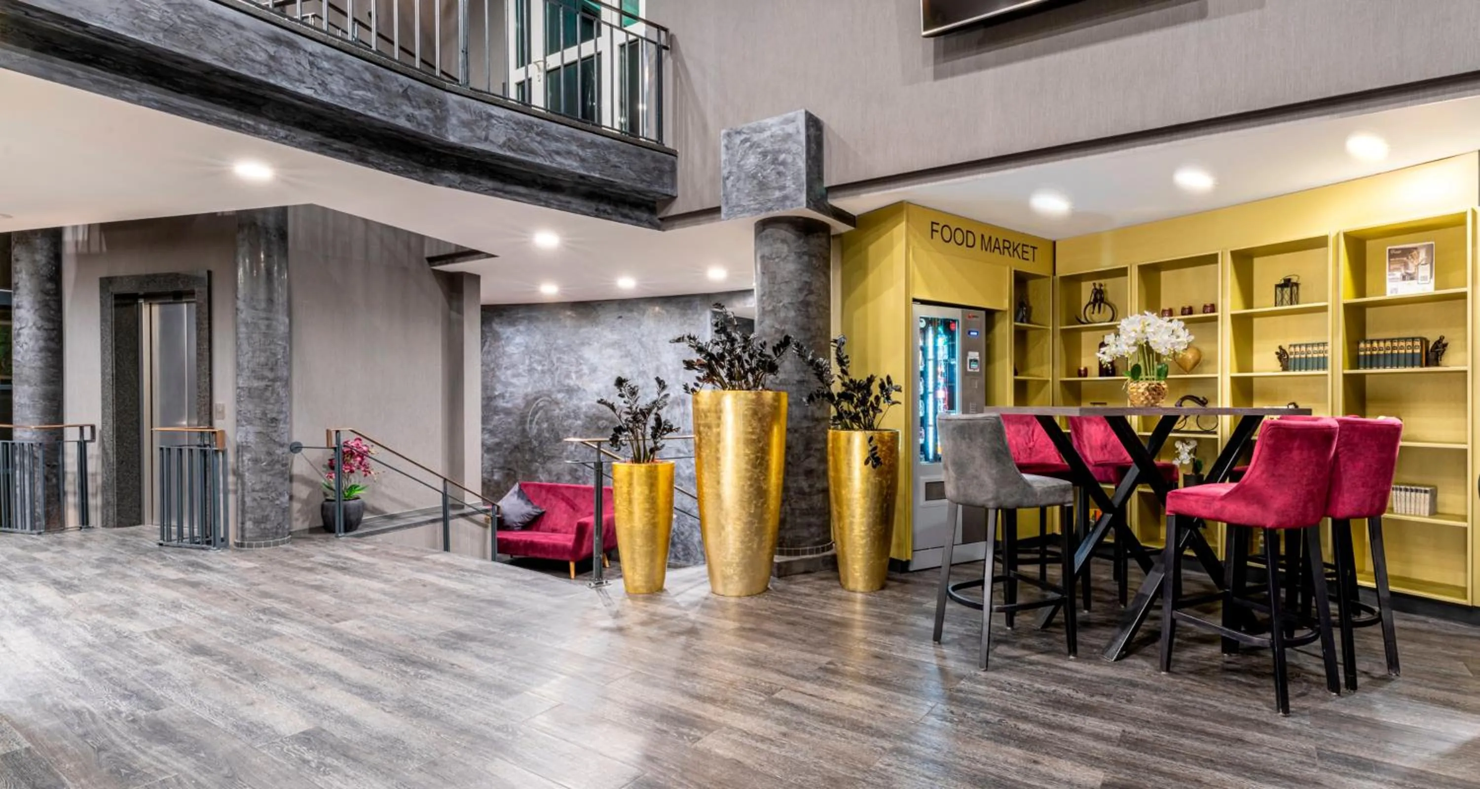 Lobby or reception in PLAZA Premium Parkhotel Norderstedt