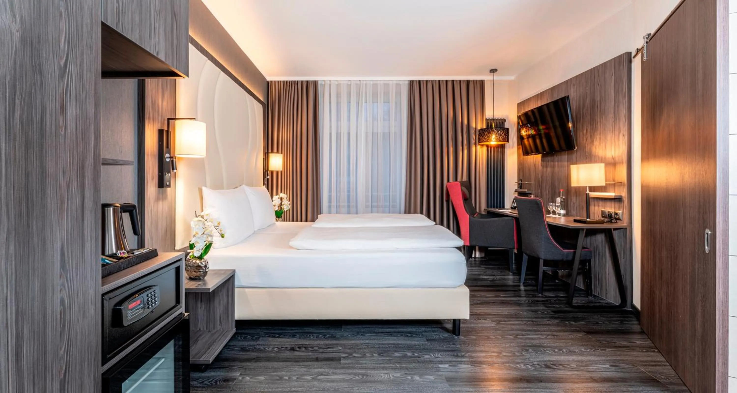 Bed in PLAZA Premium Parkhotel Norderstedt