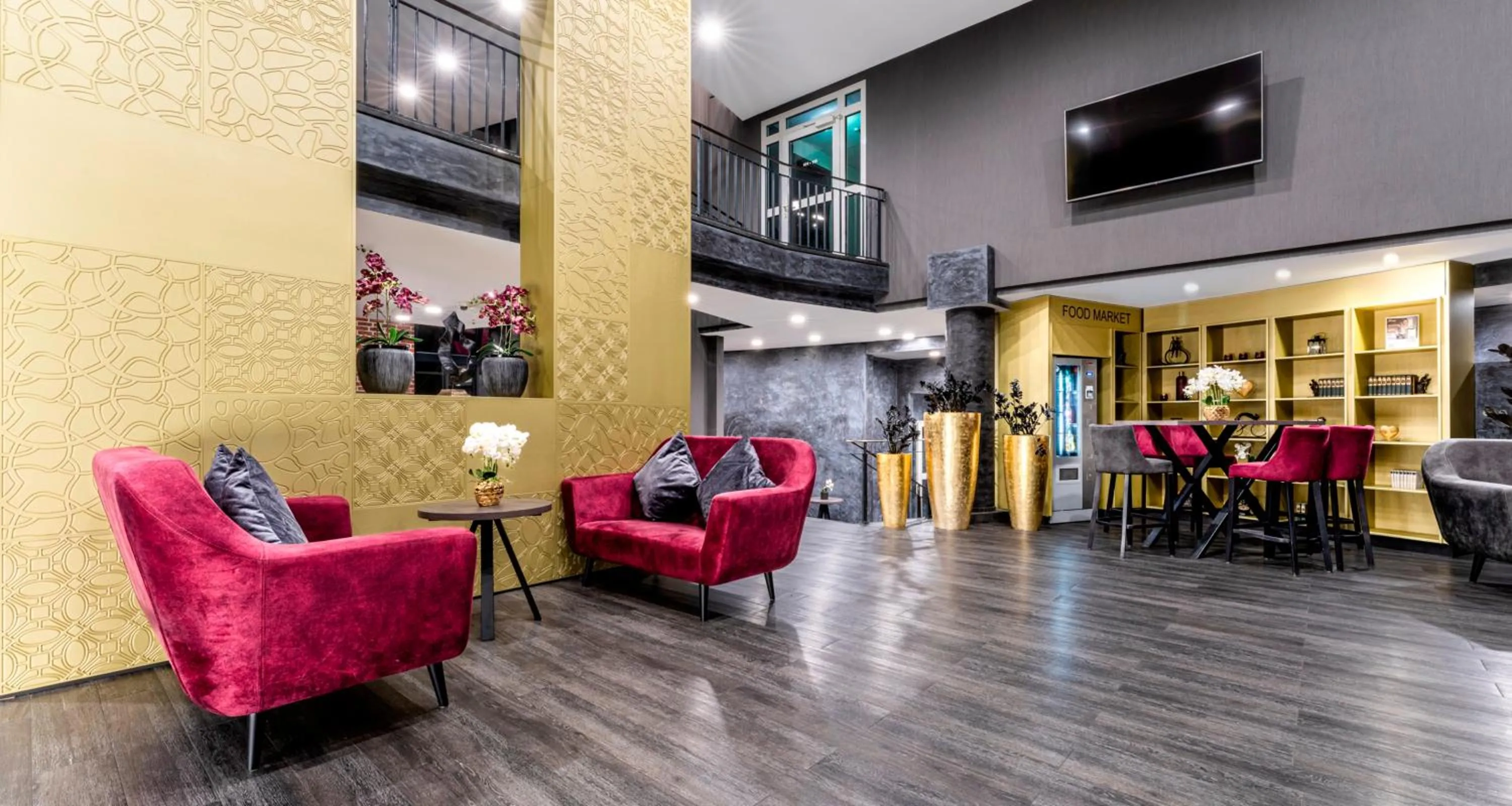 Lobby or reception in PLAZA Premium Parkhotel Norderstedt