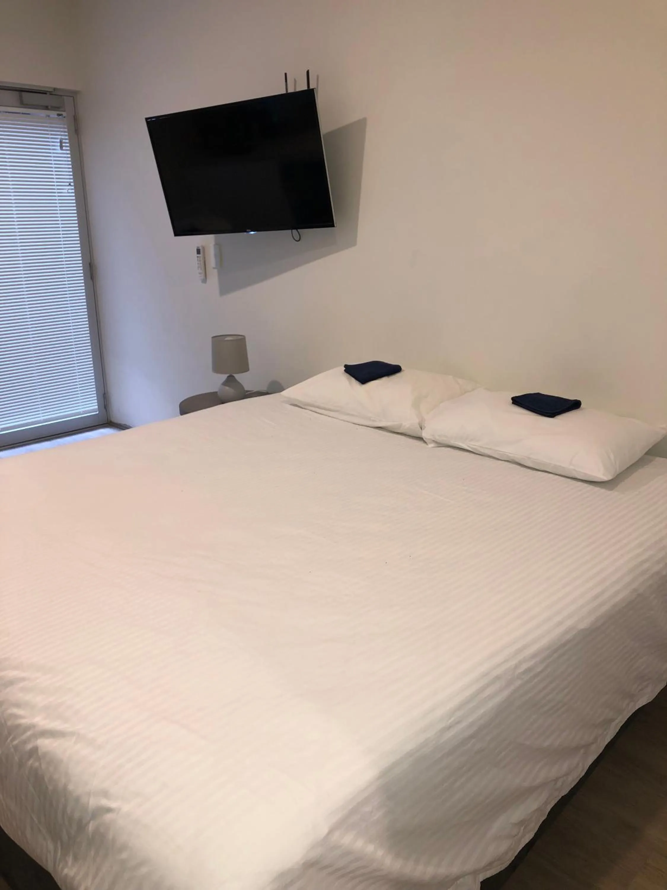 Bed in Bondi Beach Studios Suite