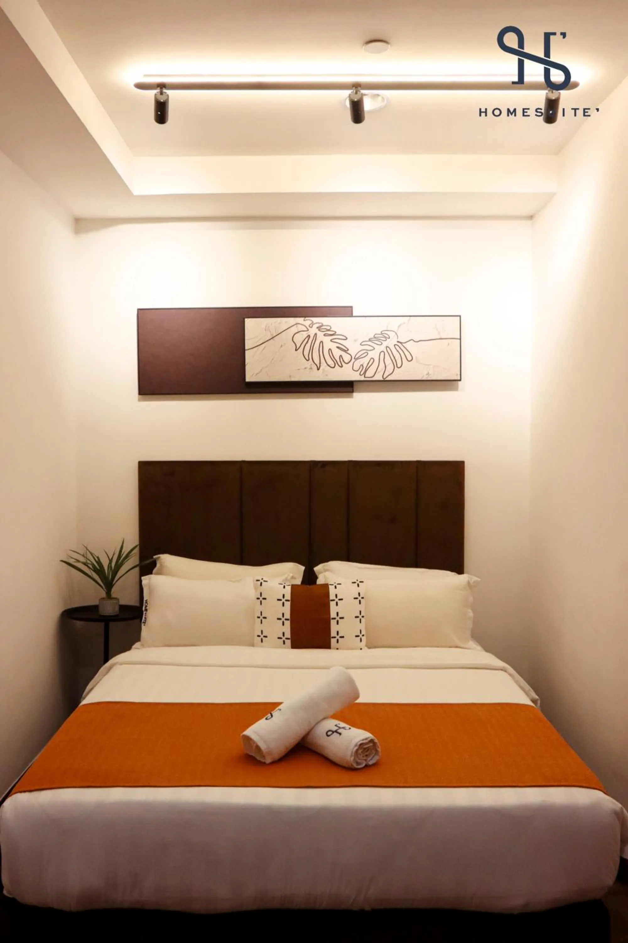 Photo of the whole room, Bed in Homesuite' Home at Riverson Soho