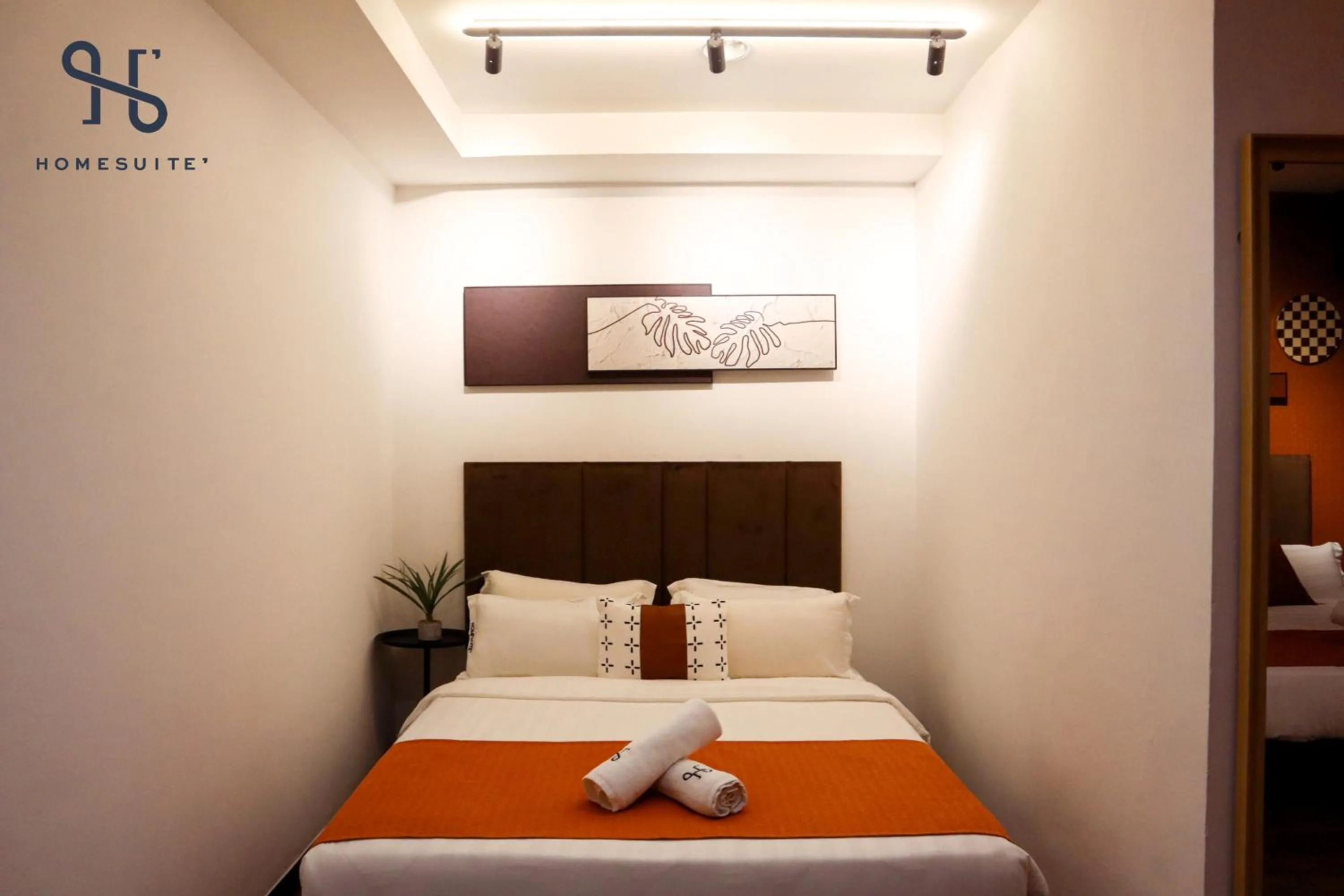 Photo of the whole room, Bed in Homesuite' Home at Riverson Soho