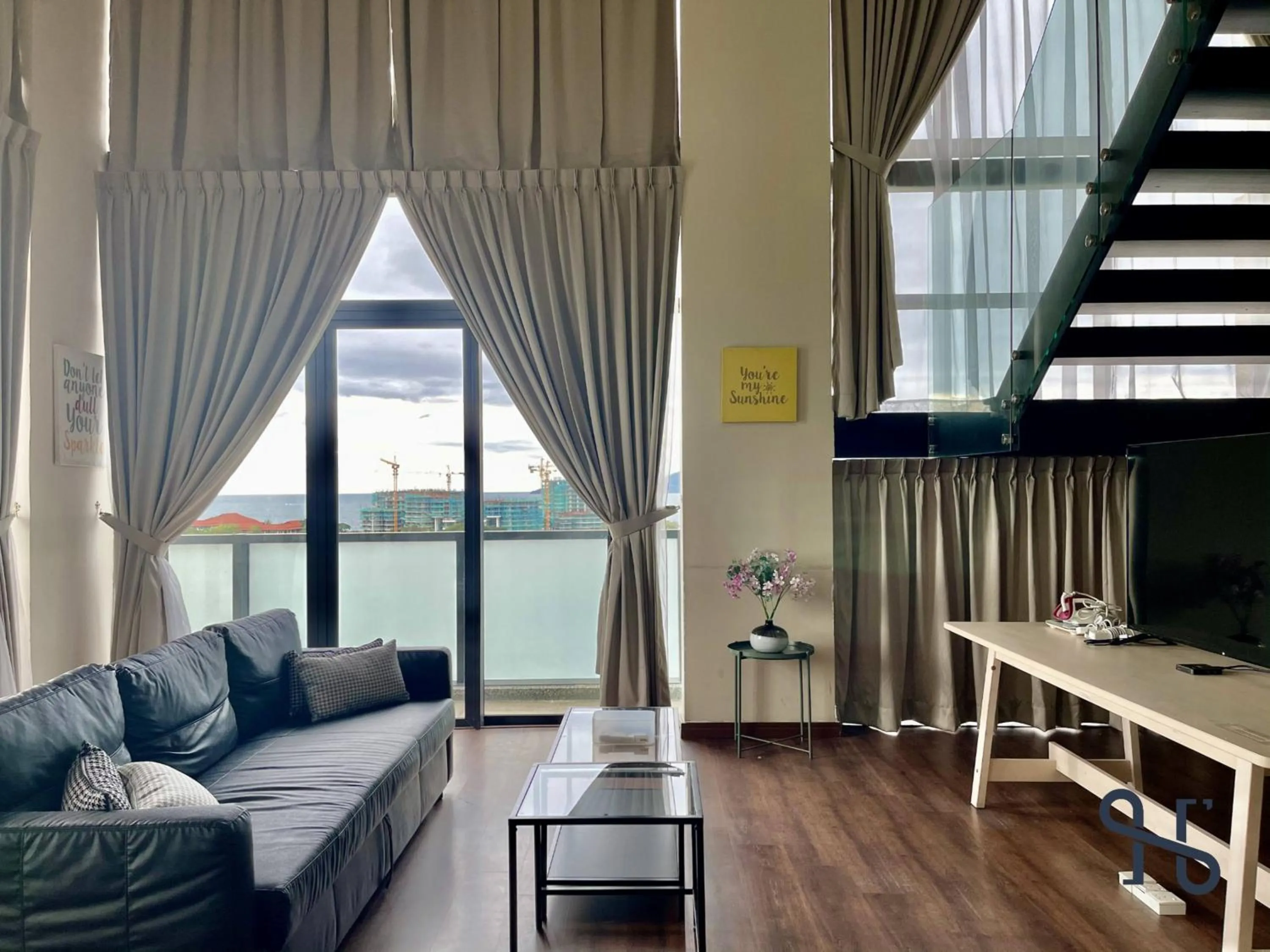 Living room in Homesuite' Home at Riverson Soho