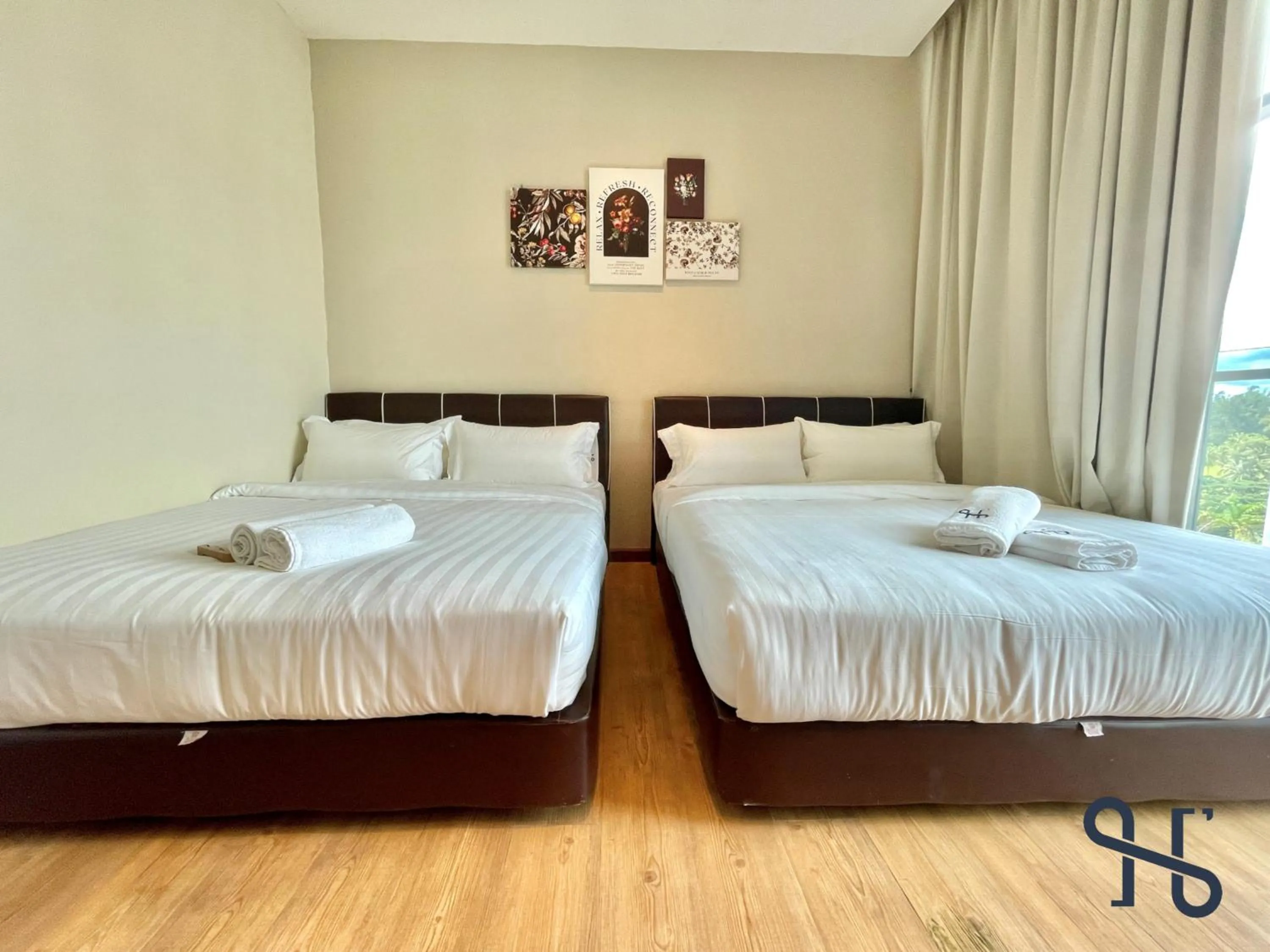 Photo of the whole room, Bed in Homesuite' Home at Riverson Soho