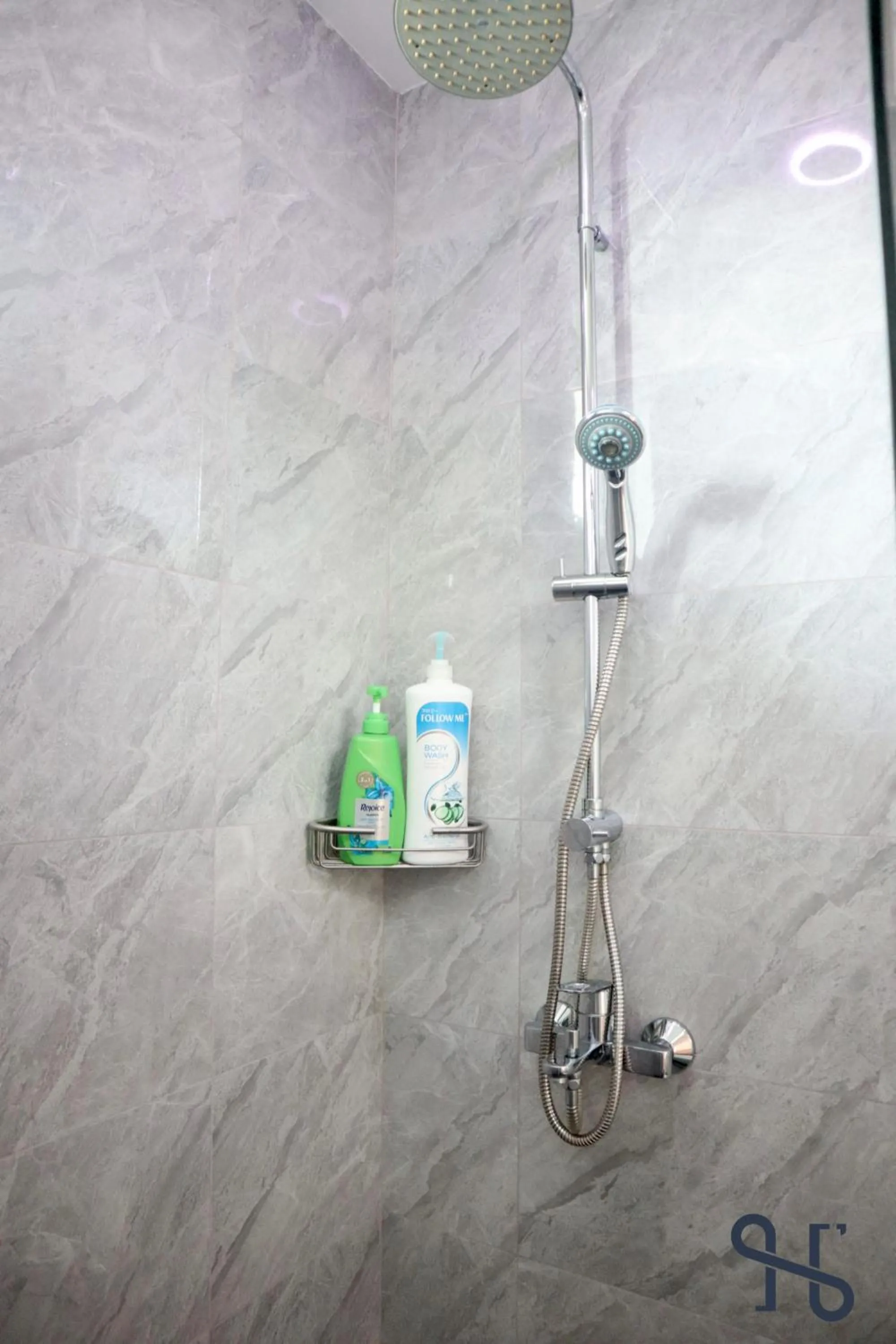 Shower in Homesuite' Home at Riverson Soho