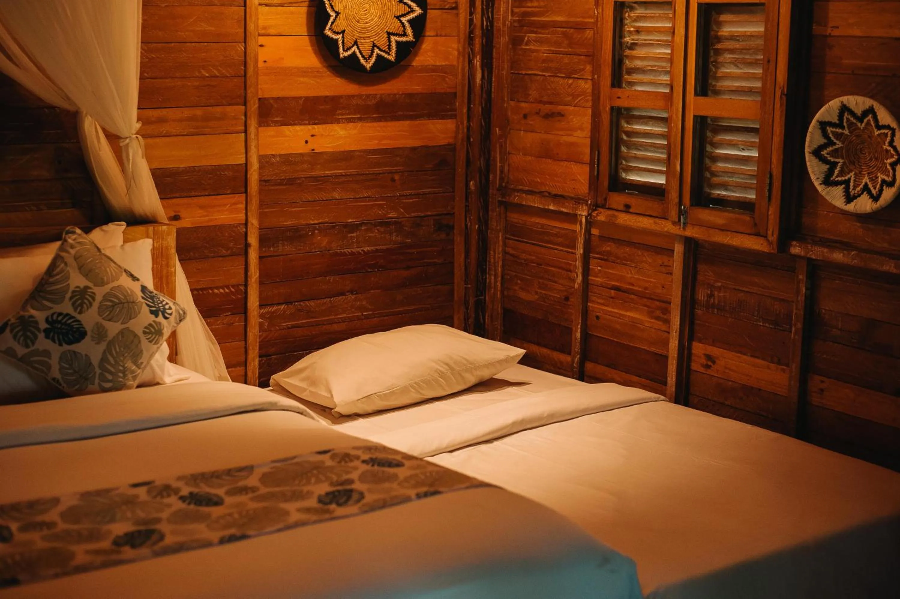 Bed in Nauna Villa Bali