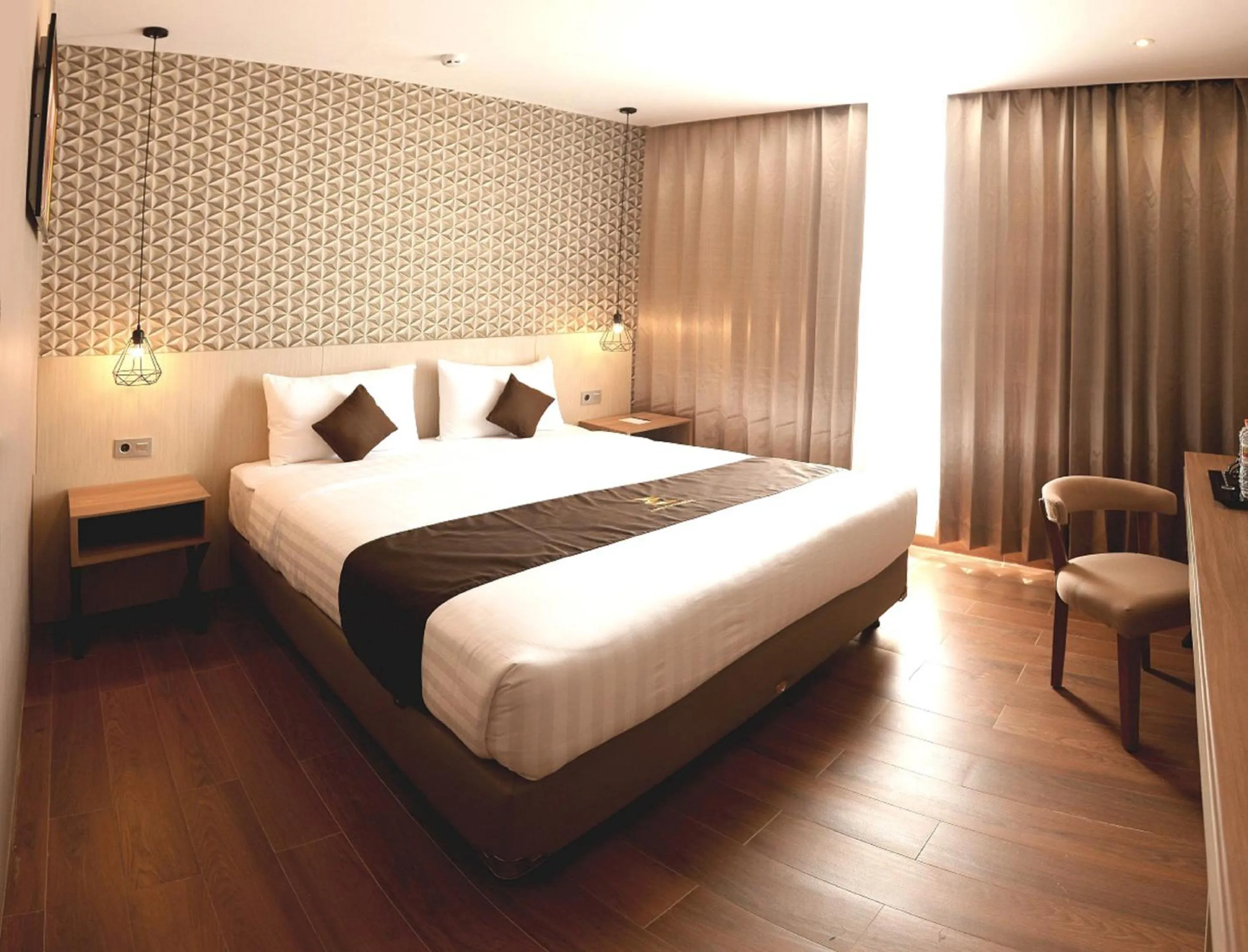Bed in Zenith Premiere Hotel Baubau