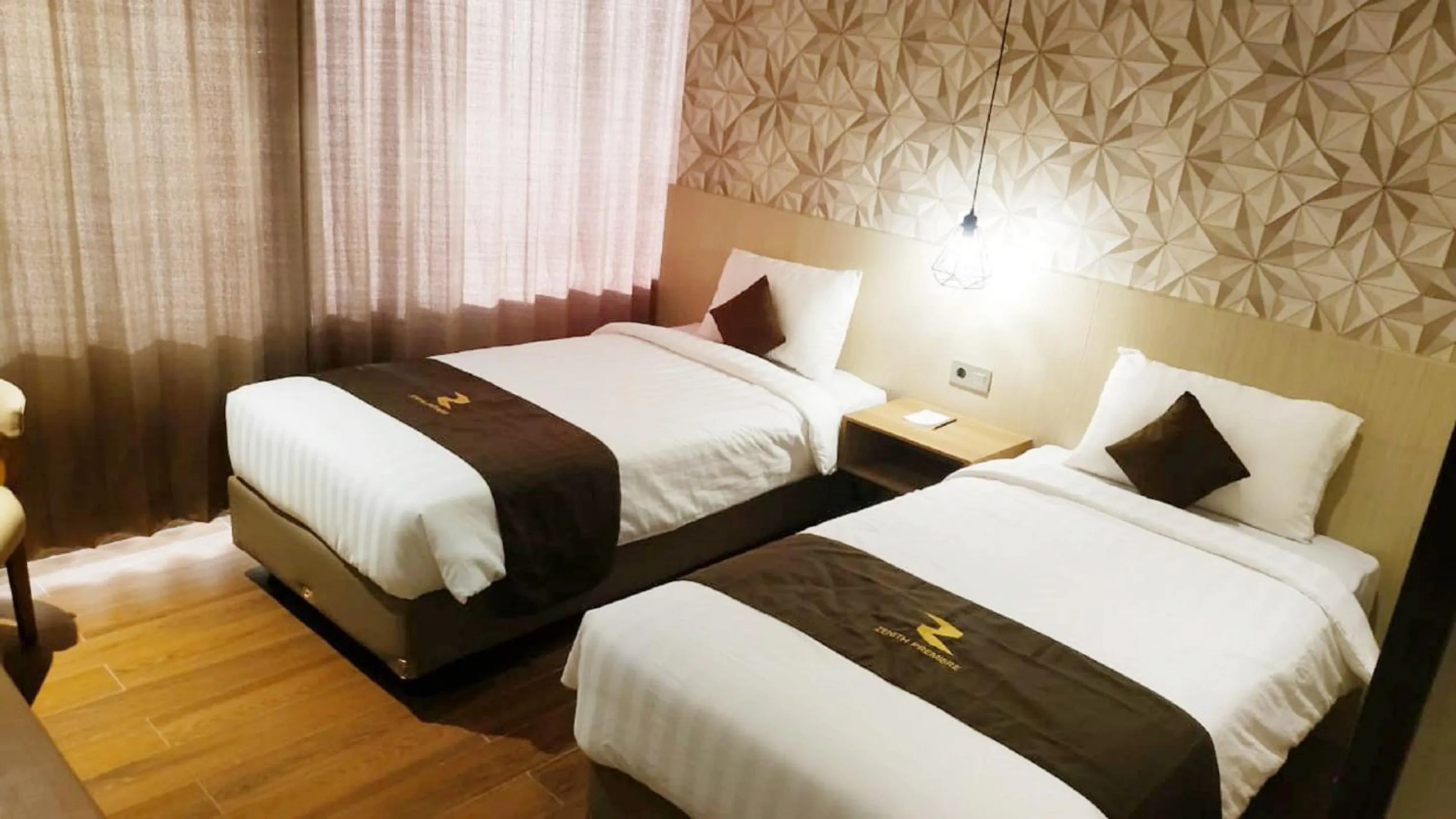 Bed in Zenith Premiere Hotel Baubau