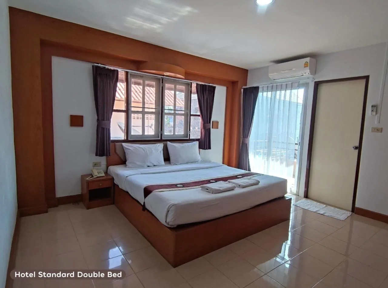 Bed in Areena Resort and Hotel Uttaradit