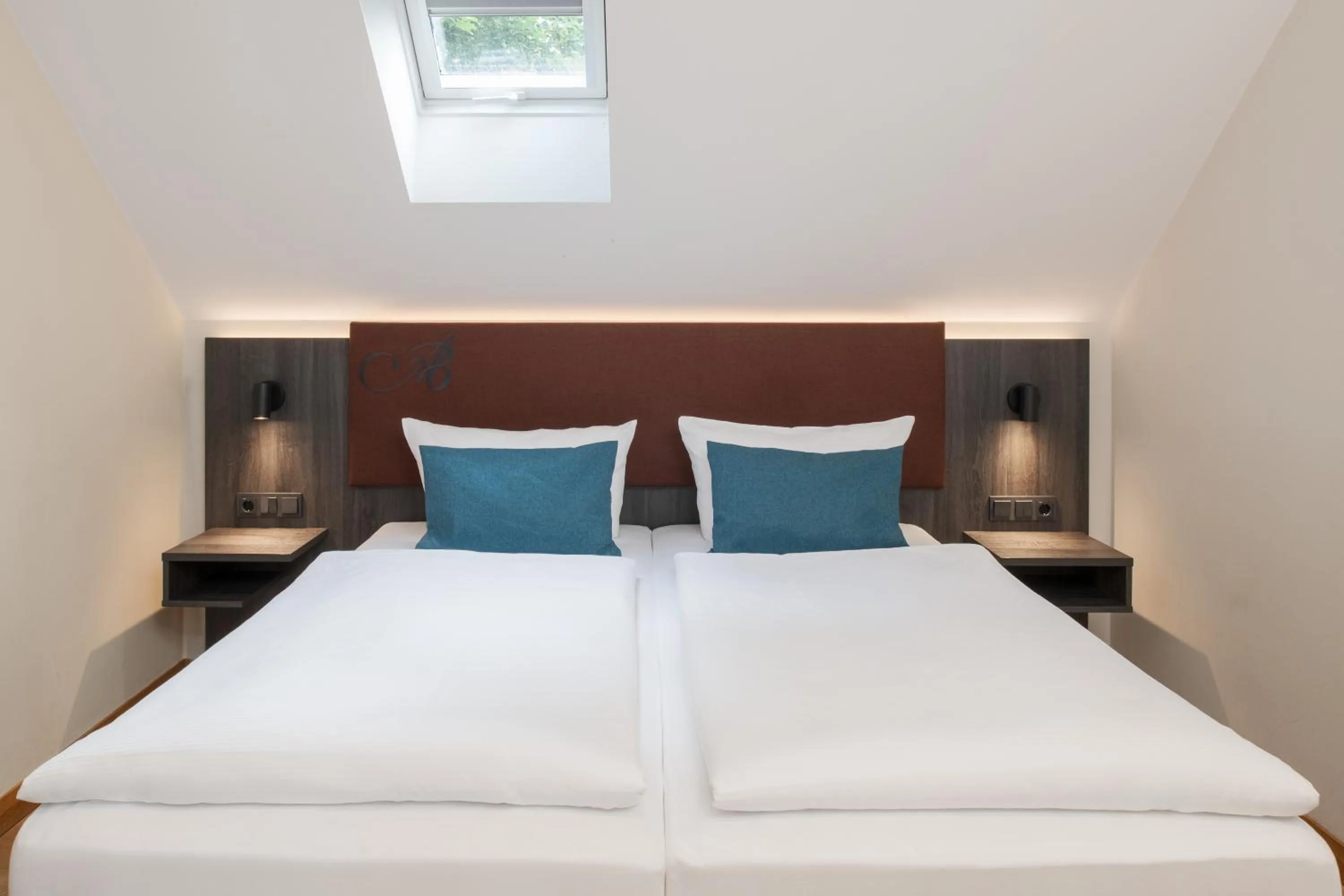 Bed in Hotel Aiterbach am Chiemsee