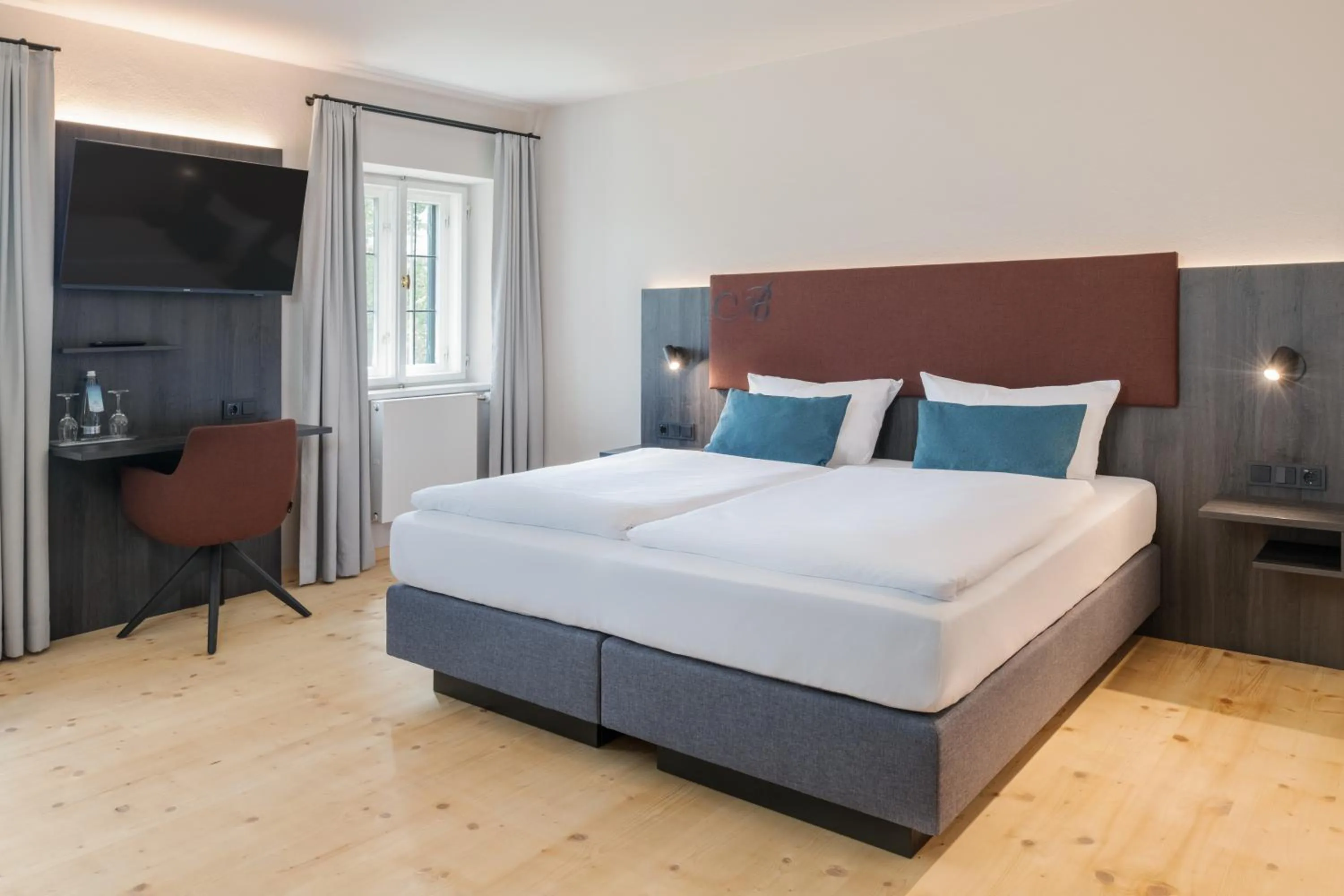 Photo of the whole room, Bed in Hotel Aiterbach am Chiemsee