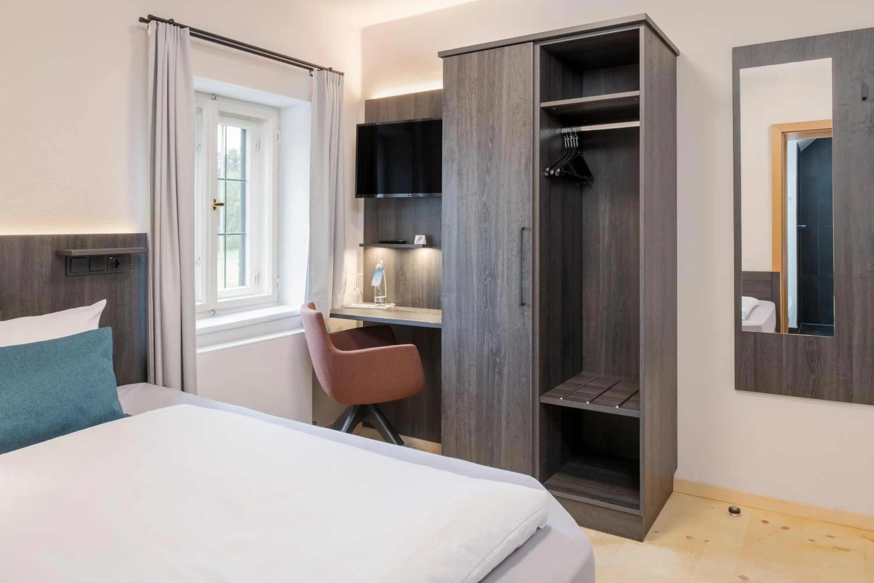 Bed in Hotel Aiterbach am Chiemsee