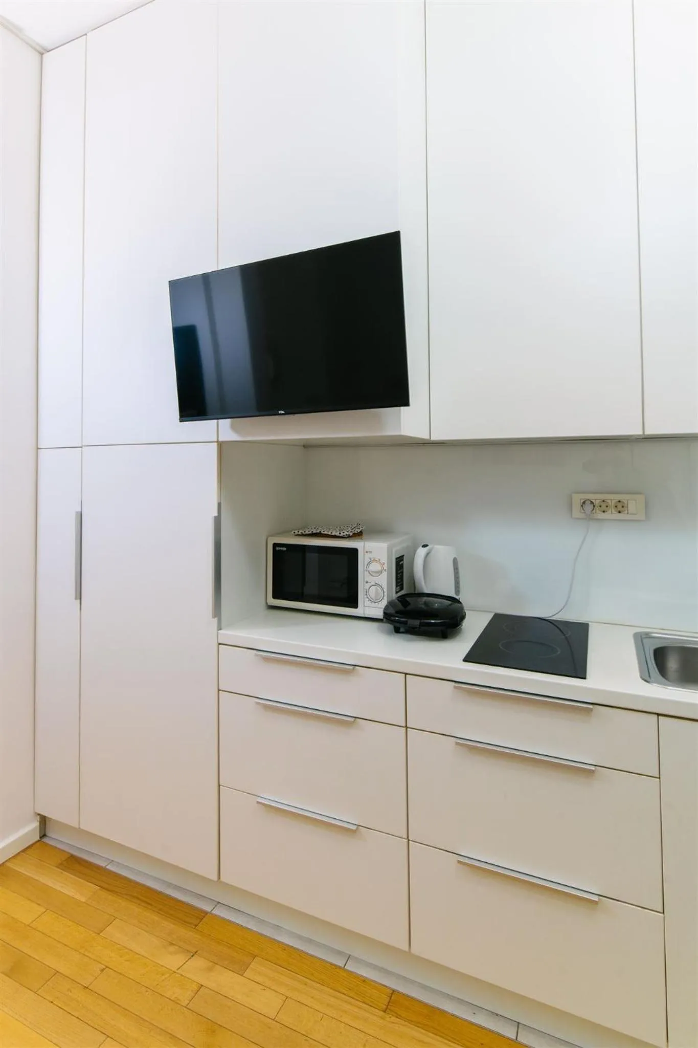 Kitchen or kitchenette in Tia Apartments and Rooms