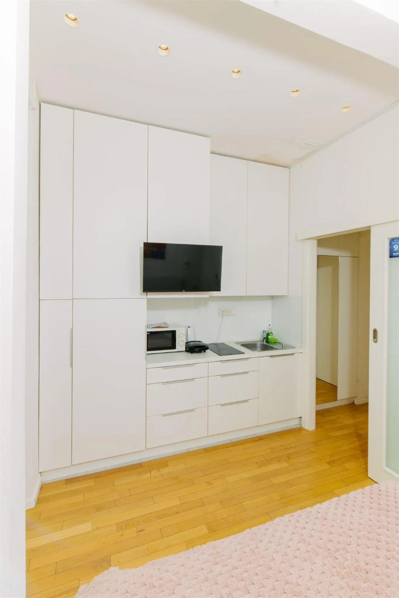 Kitchen or kitchenette in Tia Apartments and Rooms