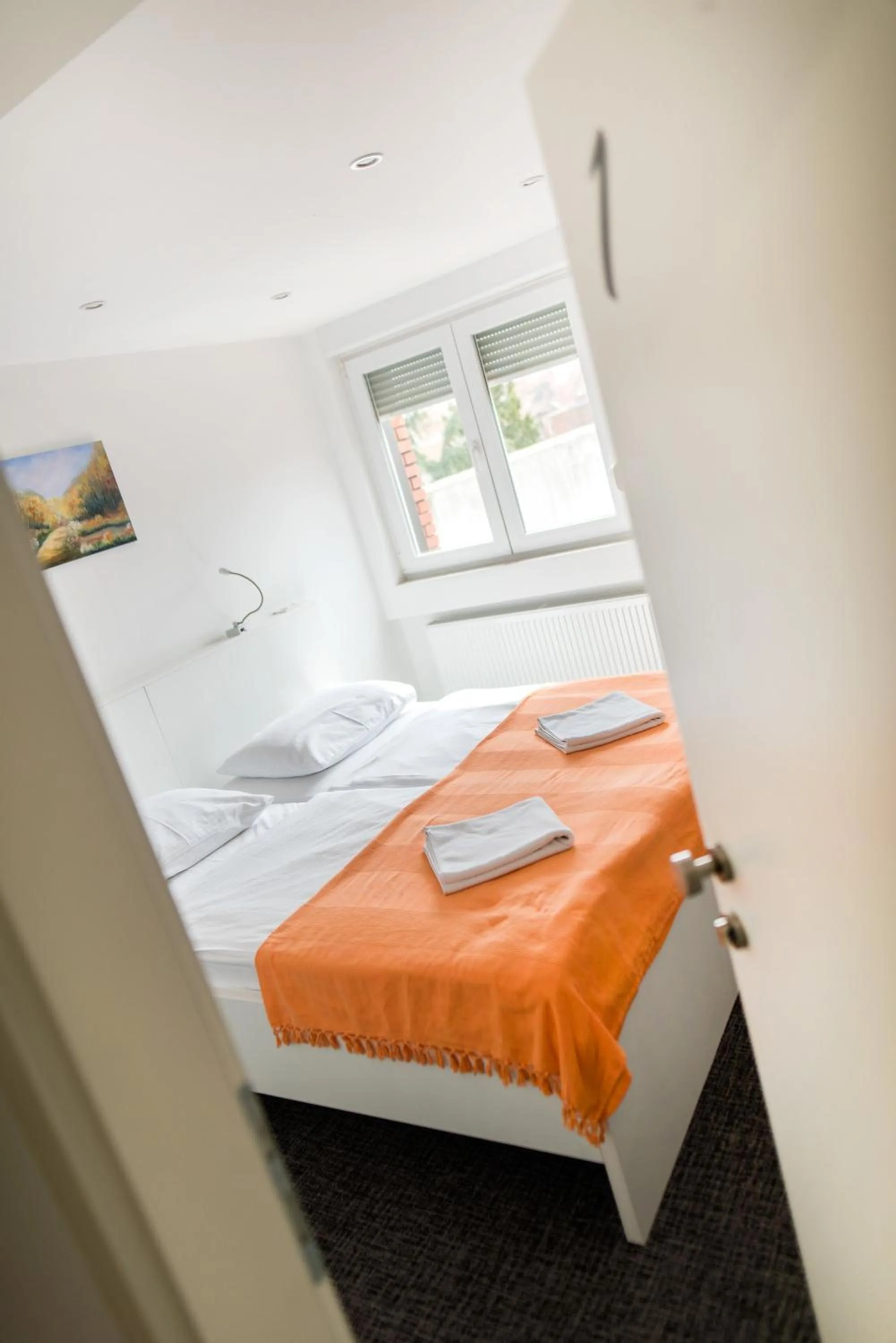 Bed in Tia Apartments and Rooms