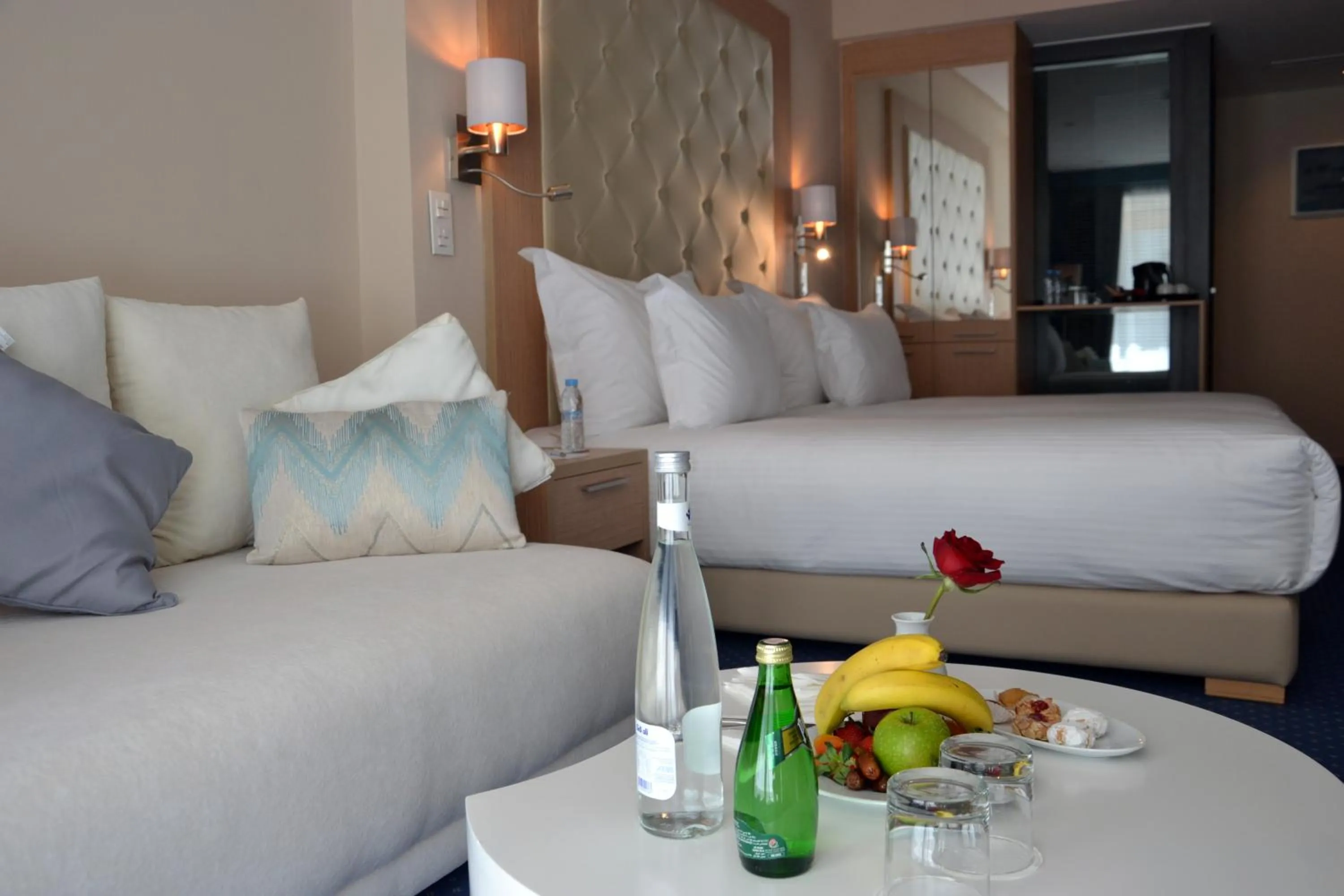 Seating area, Bed in Flower Town Hotel & Spa