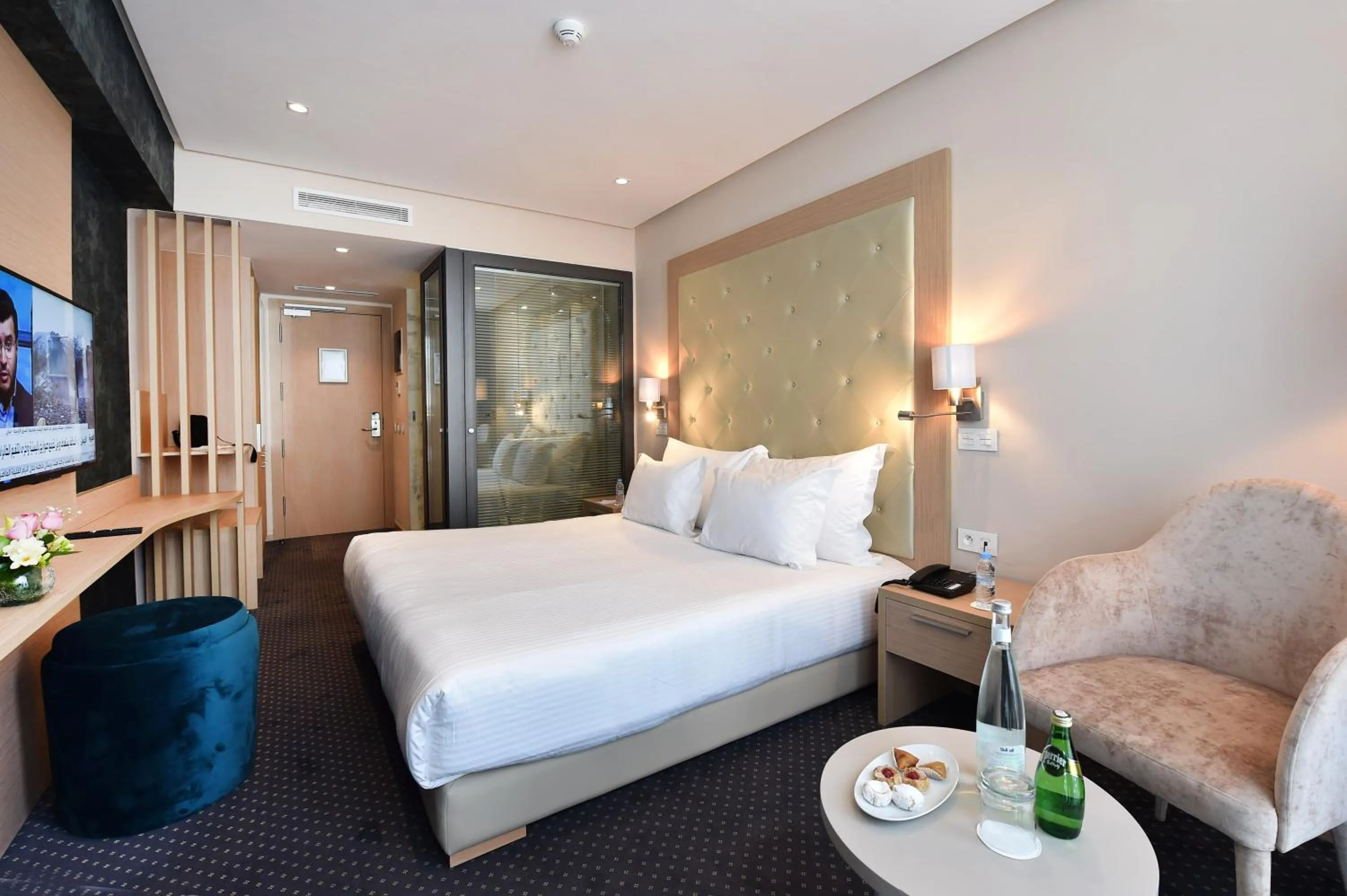 Bed in Flower Town Hotel & Spa