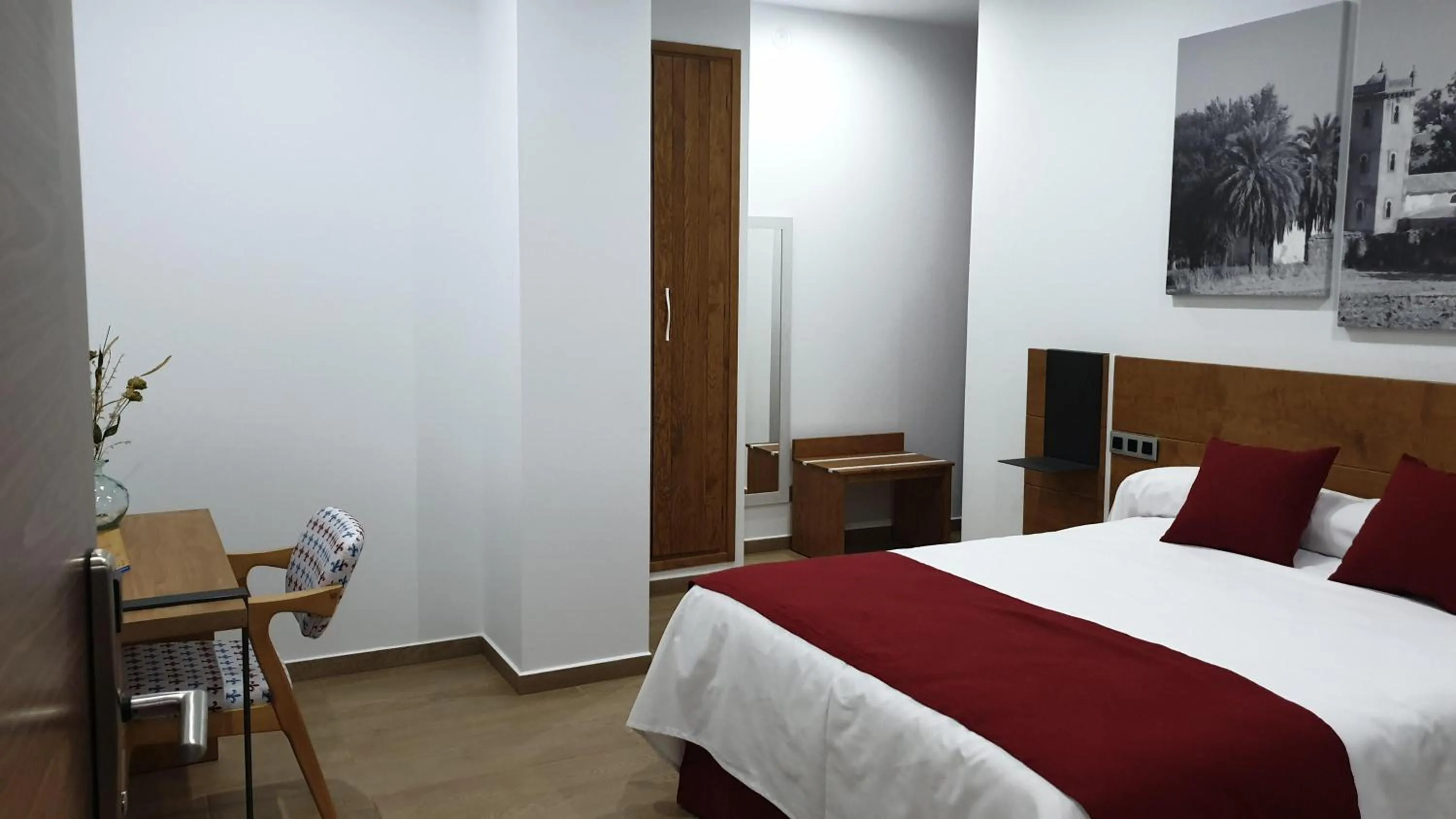 Bed in HOTEL DON RAMIRO