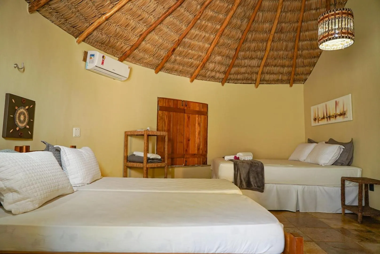 Bed in Pousada Rota dos Ventos