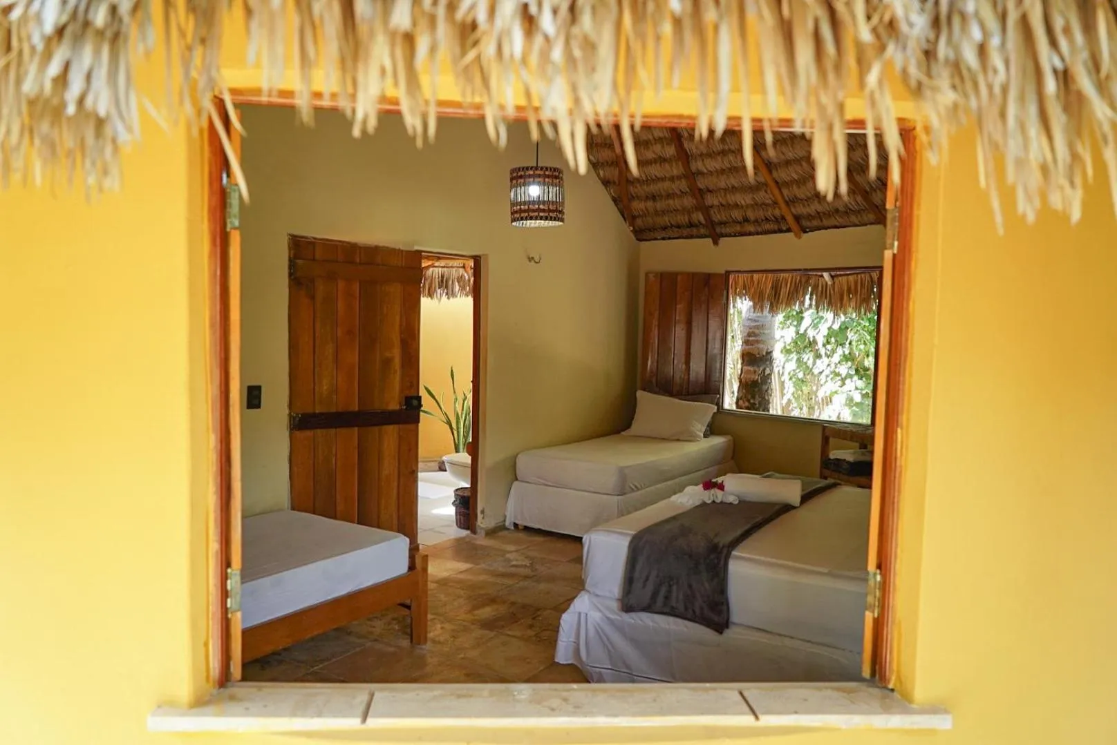 Bed in Pousada Rota dos Ventos