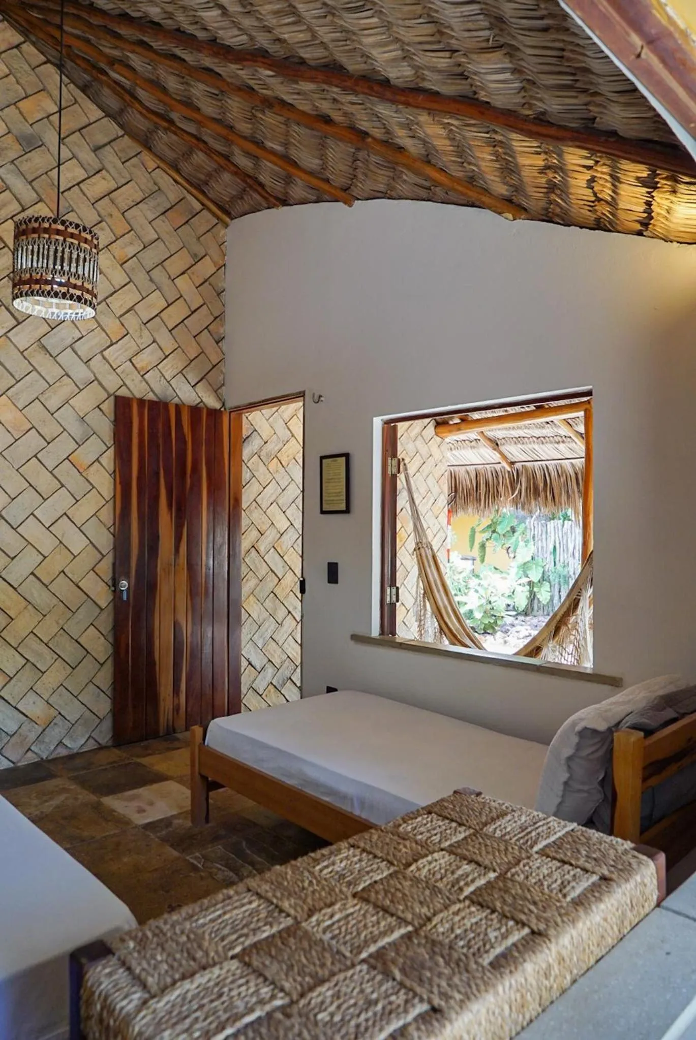 Bed in Pousada Rota dos Ventos