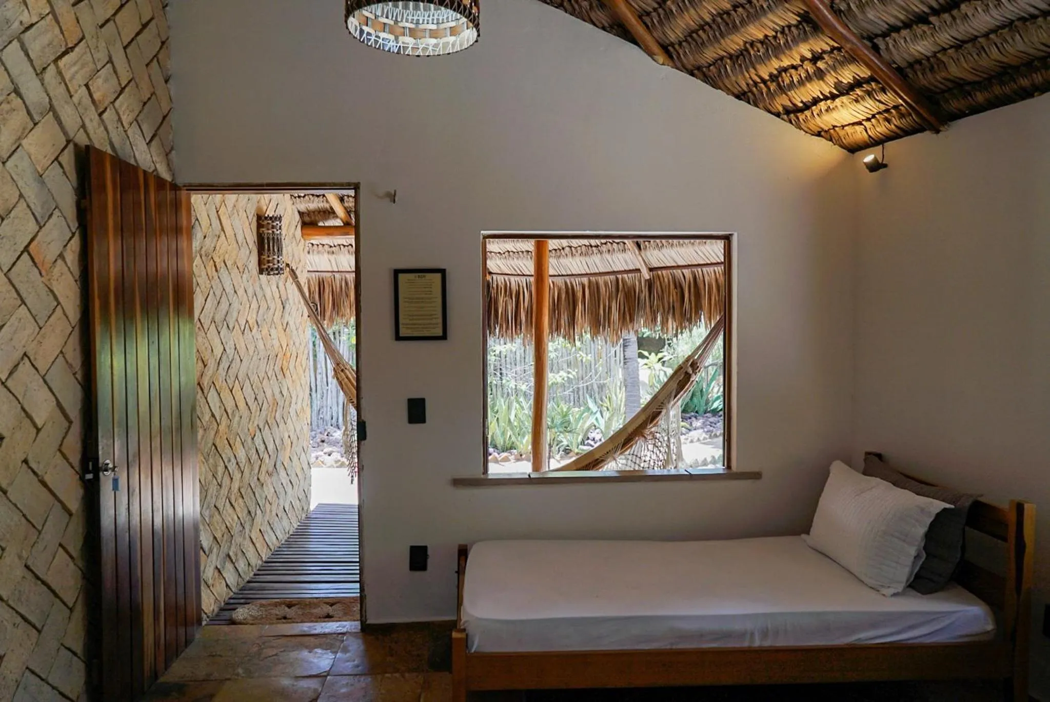 Bed in Pousada Rota dos Ventos