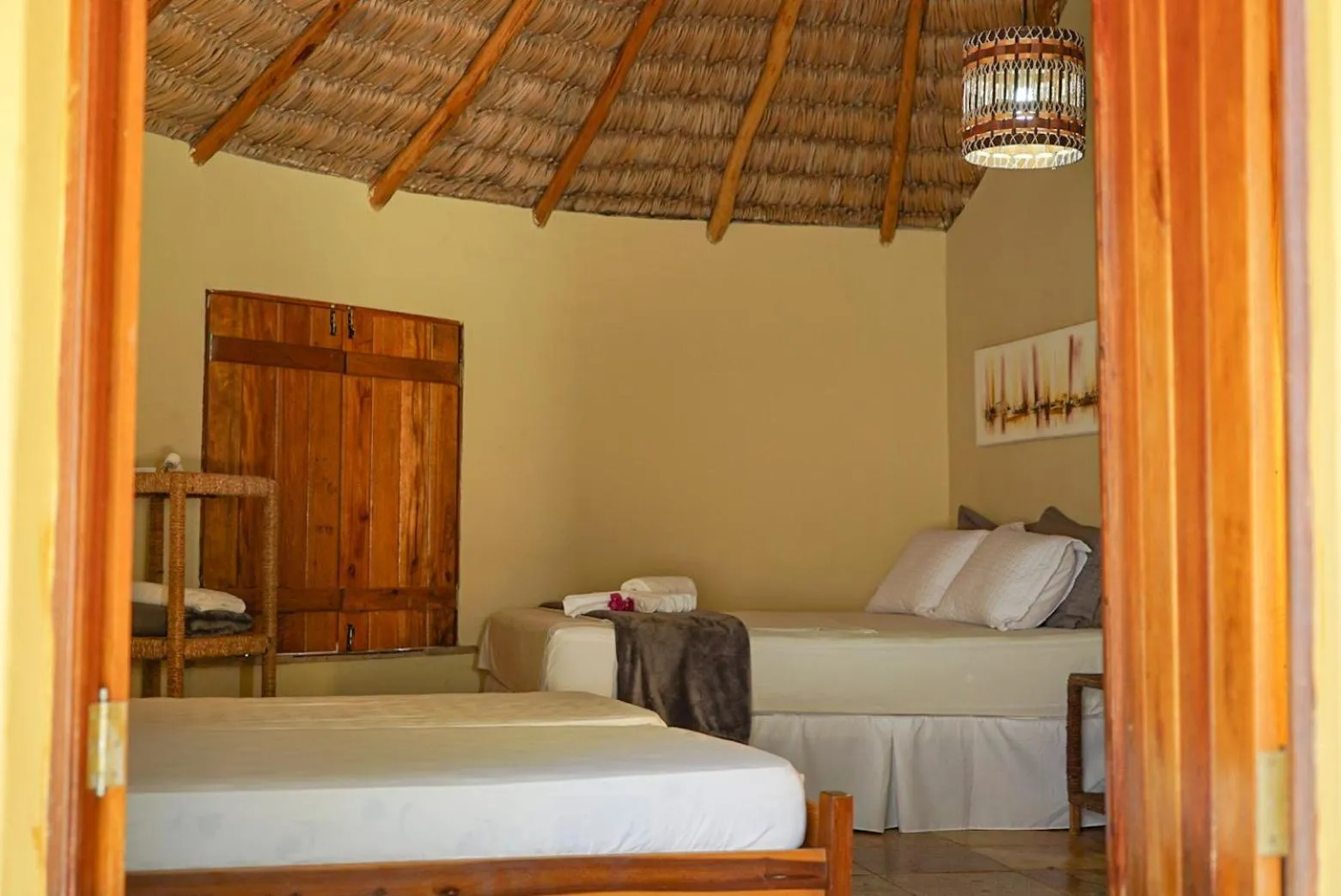 Bed in Pousada Rota dos Ventos