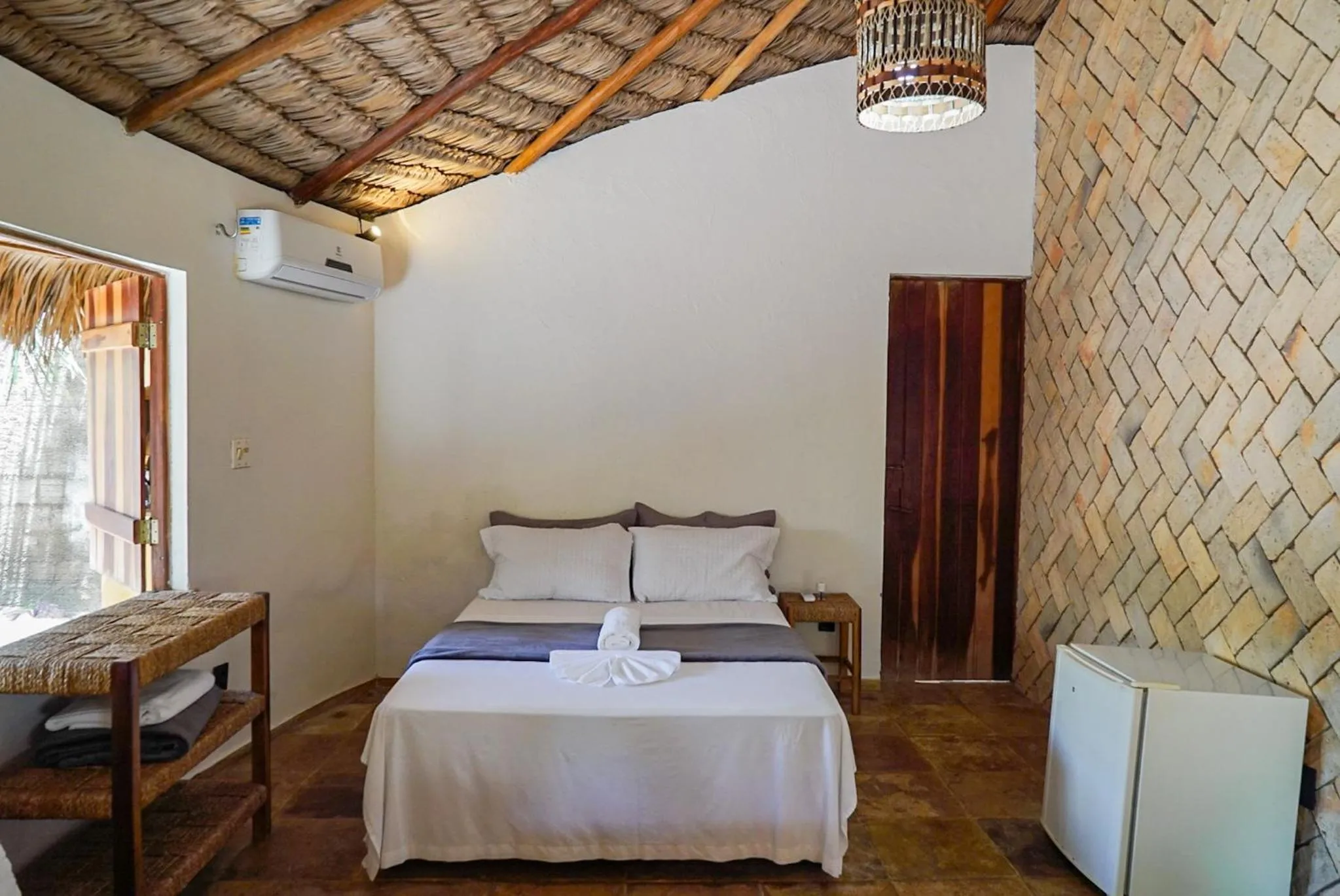 Bed in Pousada Rota dos Ventos