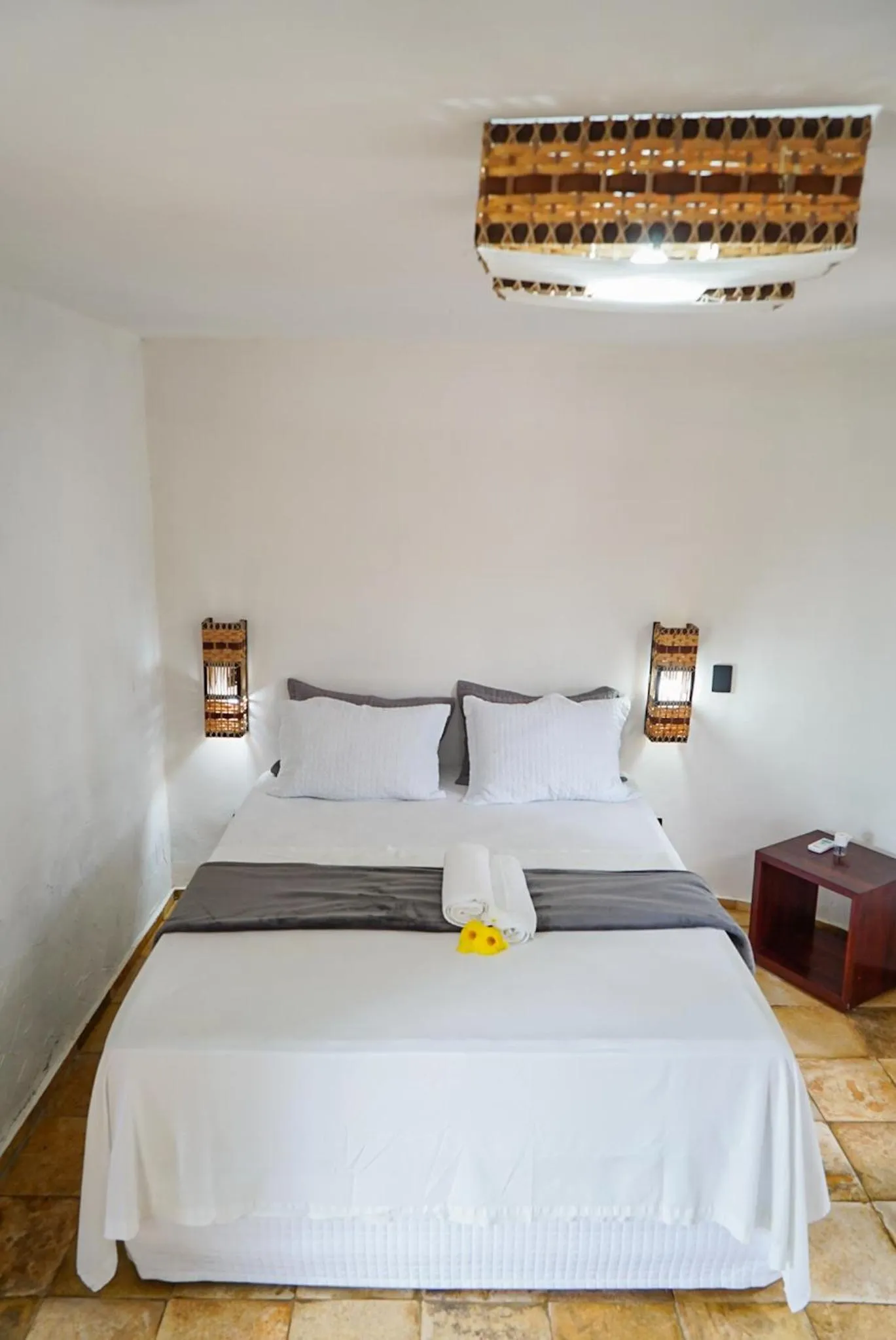 Bed in Pousada Rota dos Ventos