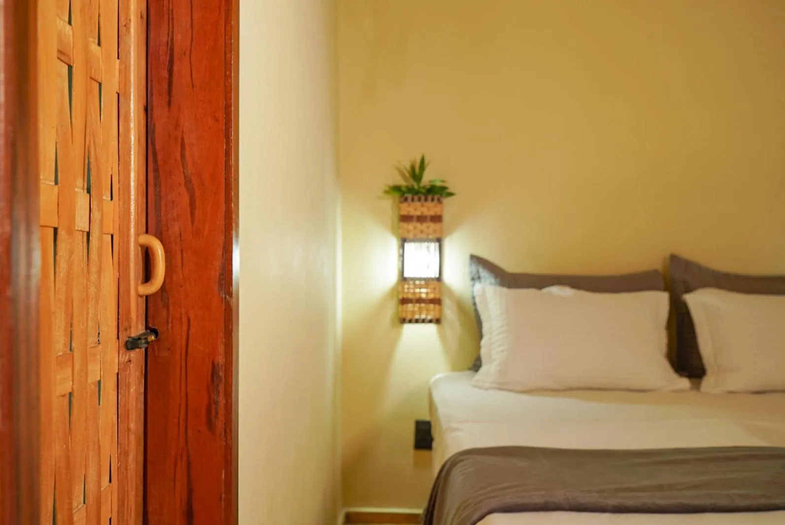 Bed in Pousada Rota dos Ventos