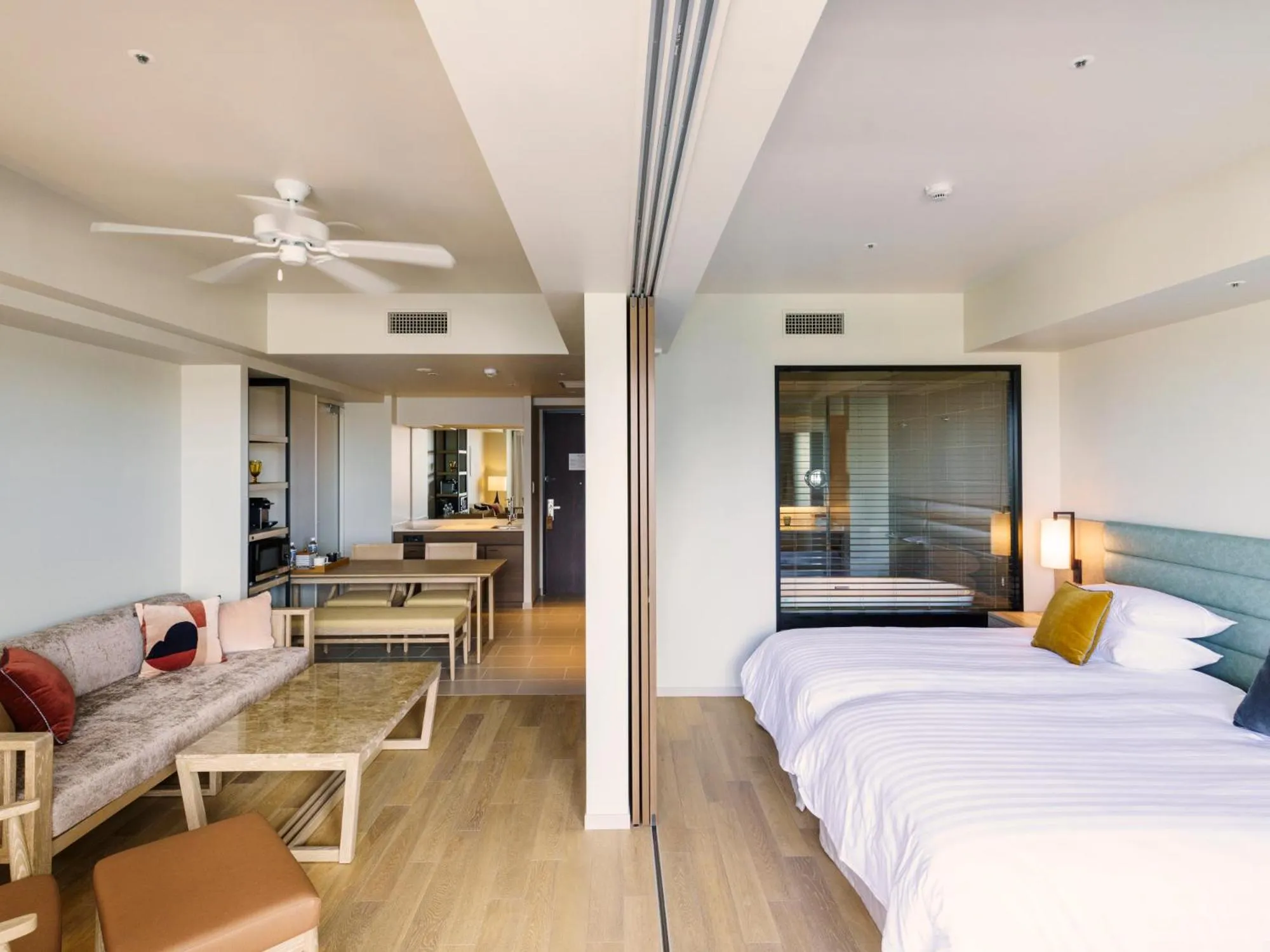 Living room, Bed in MB GALLERY CHATAN by THE TERRACE HOTELS