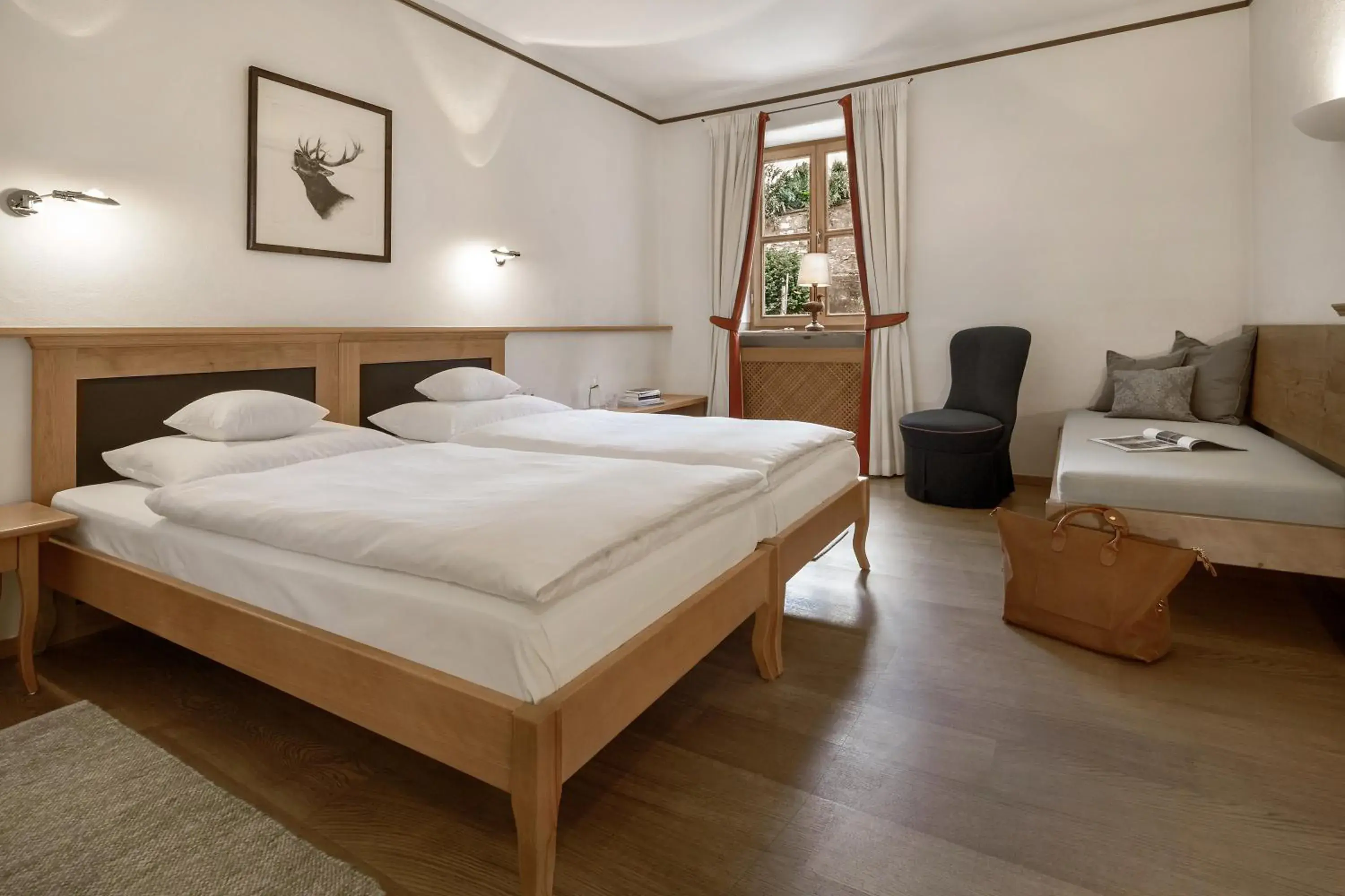 Comfort Triple Room in Gutshofhotel Winkler Bräu Comfort Triple Room in Gutshofhotel Winkler Bräu