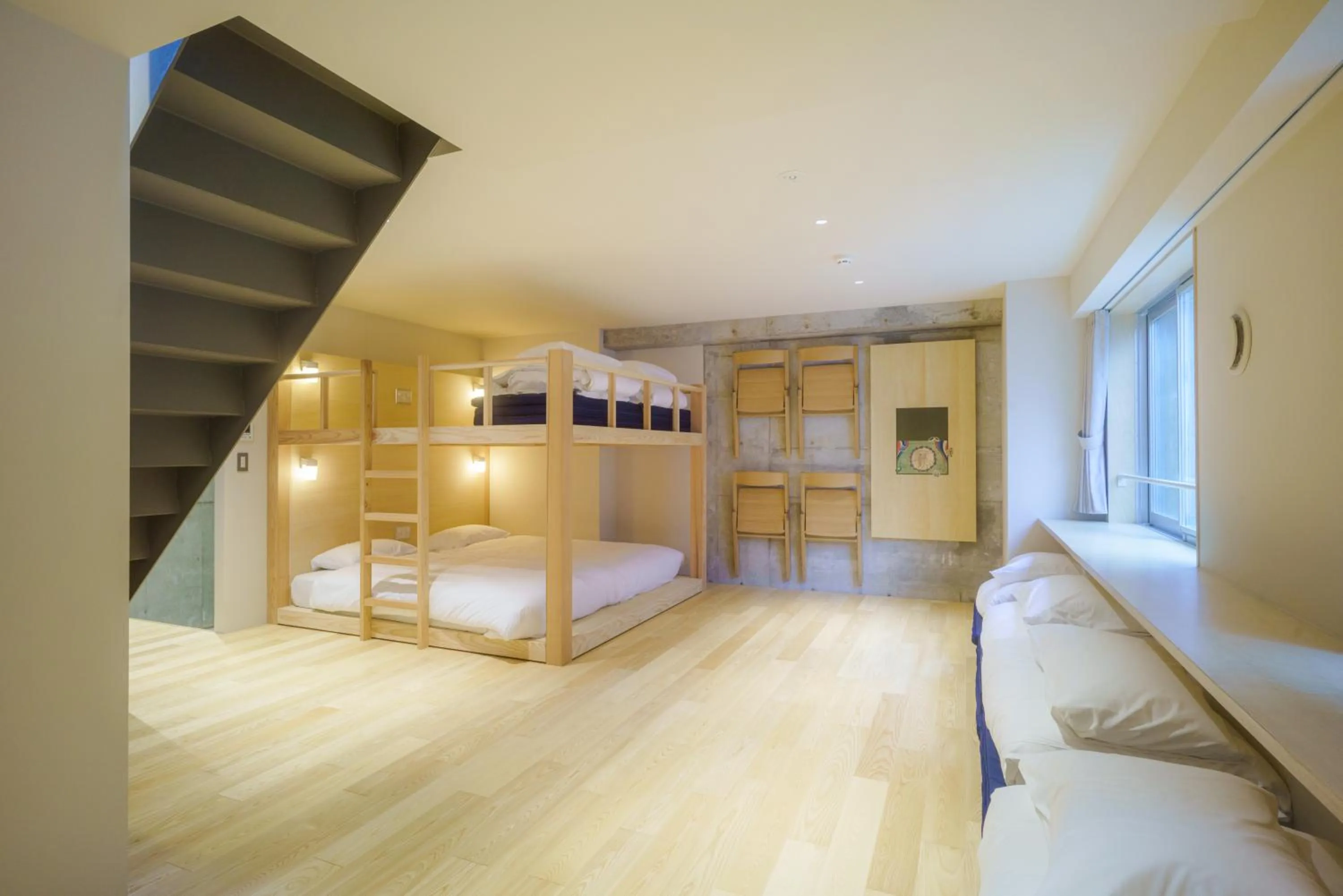 Bed in TAKAONE ACTIVITY＆STAY