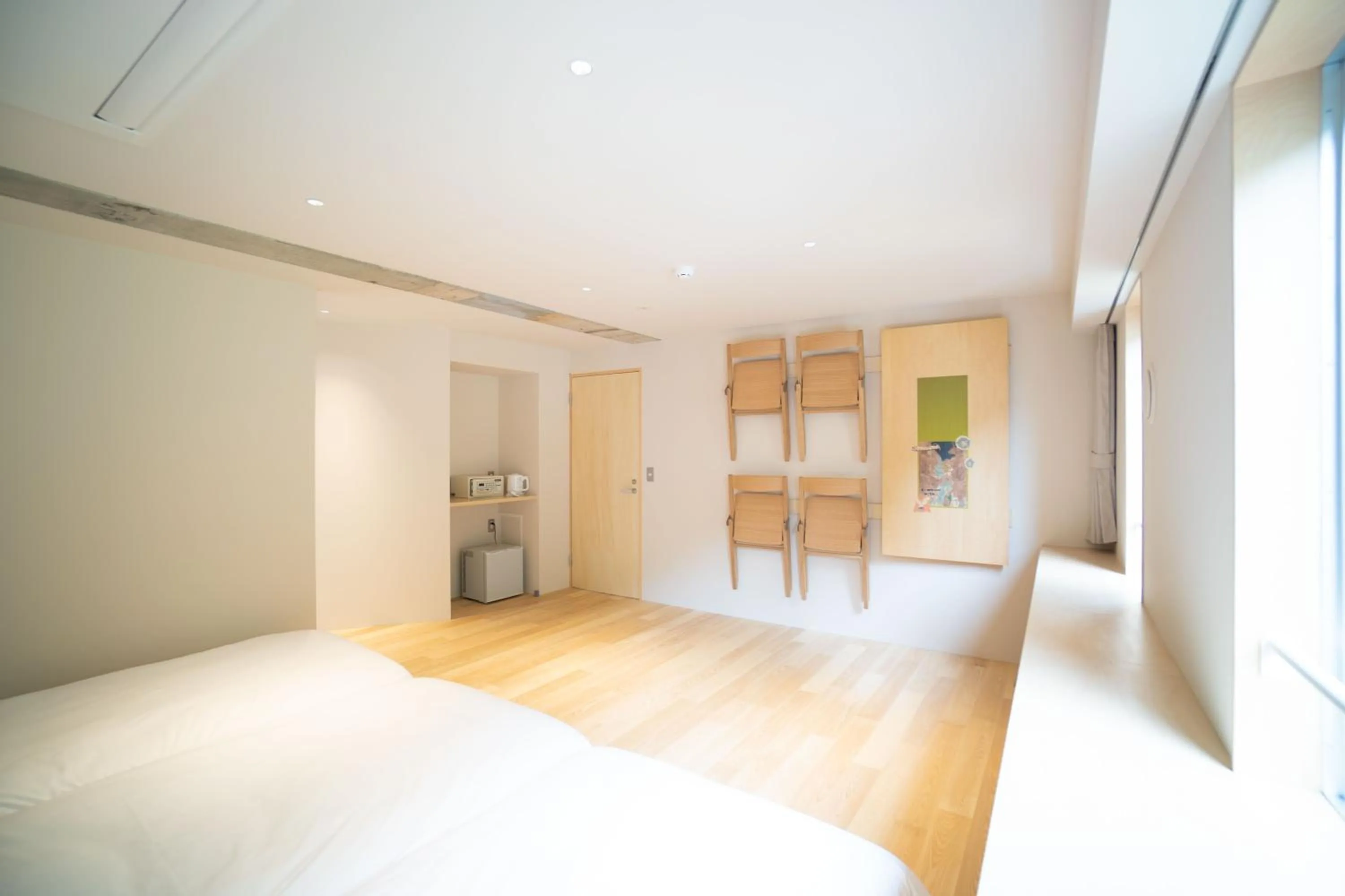 Bed in TAKAONE ACTIVITY＆STAY