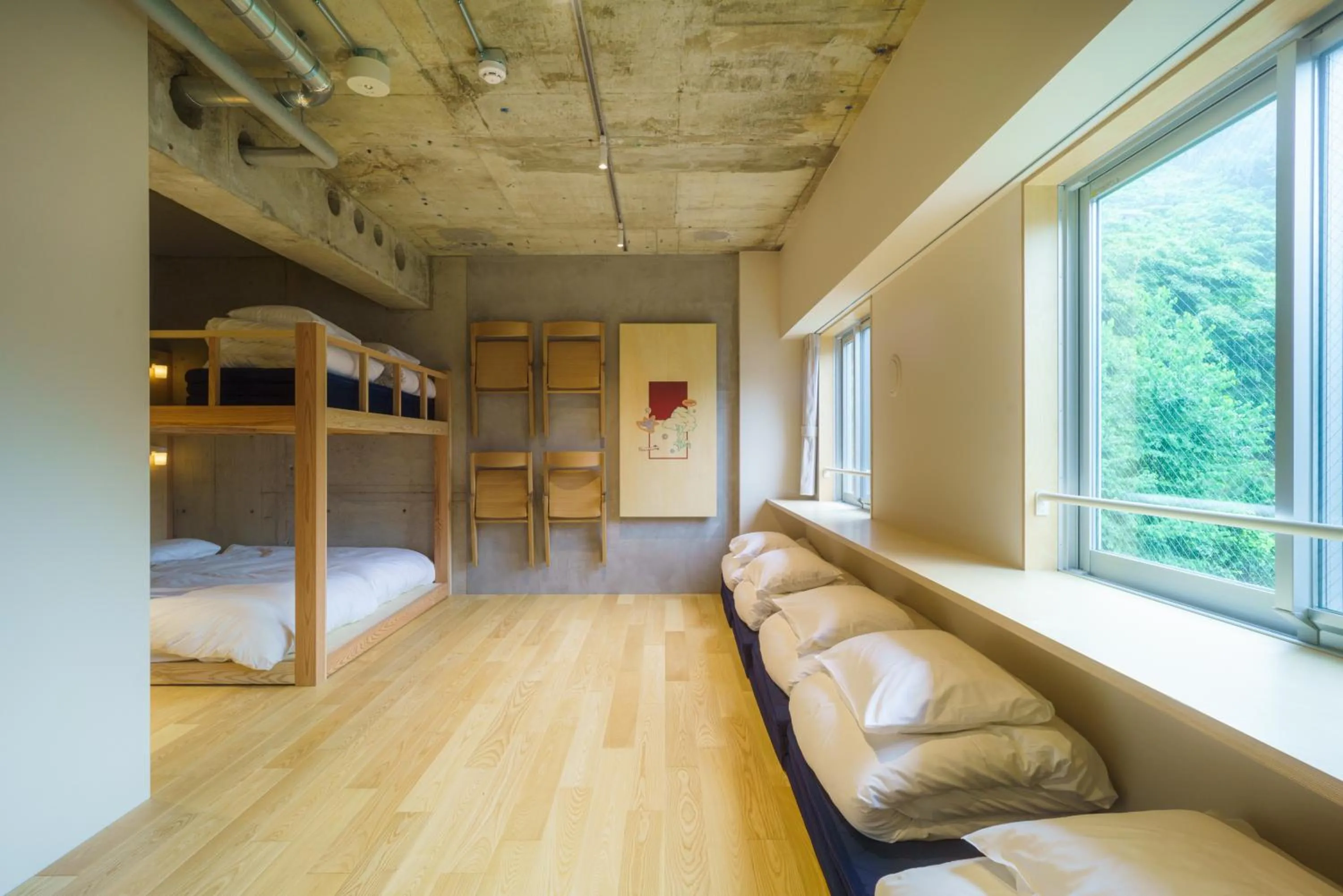 Bed in TAKAONE ACTIVITY＆STAY