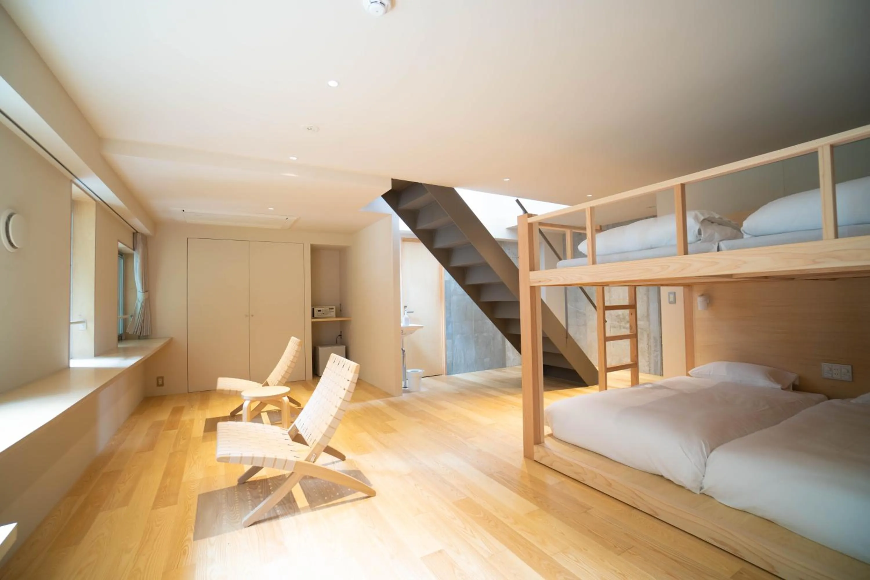 Bed in TAKAONE ACTIVITY＆STAY