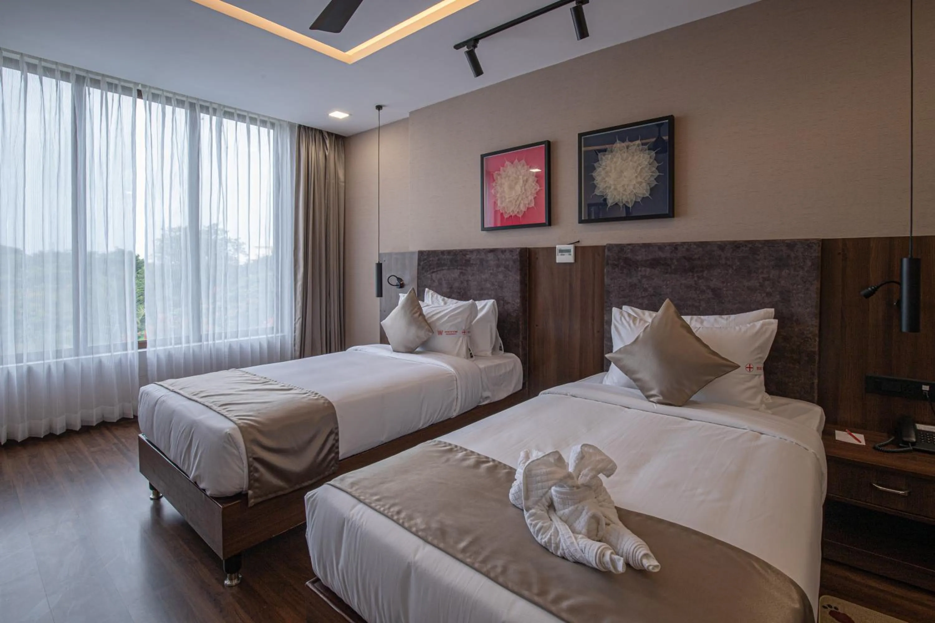 Bed in Windstone Residency