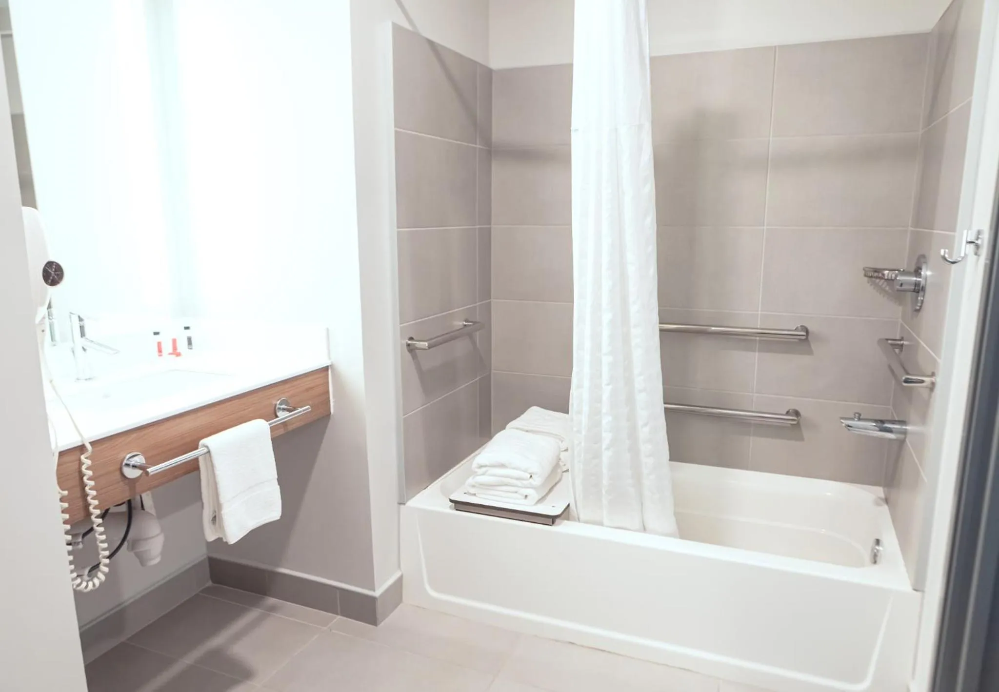 Shower in Microtel Inn & Suites by Wyndham Milford